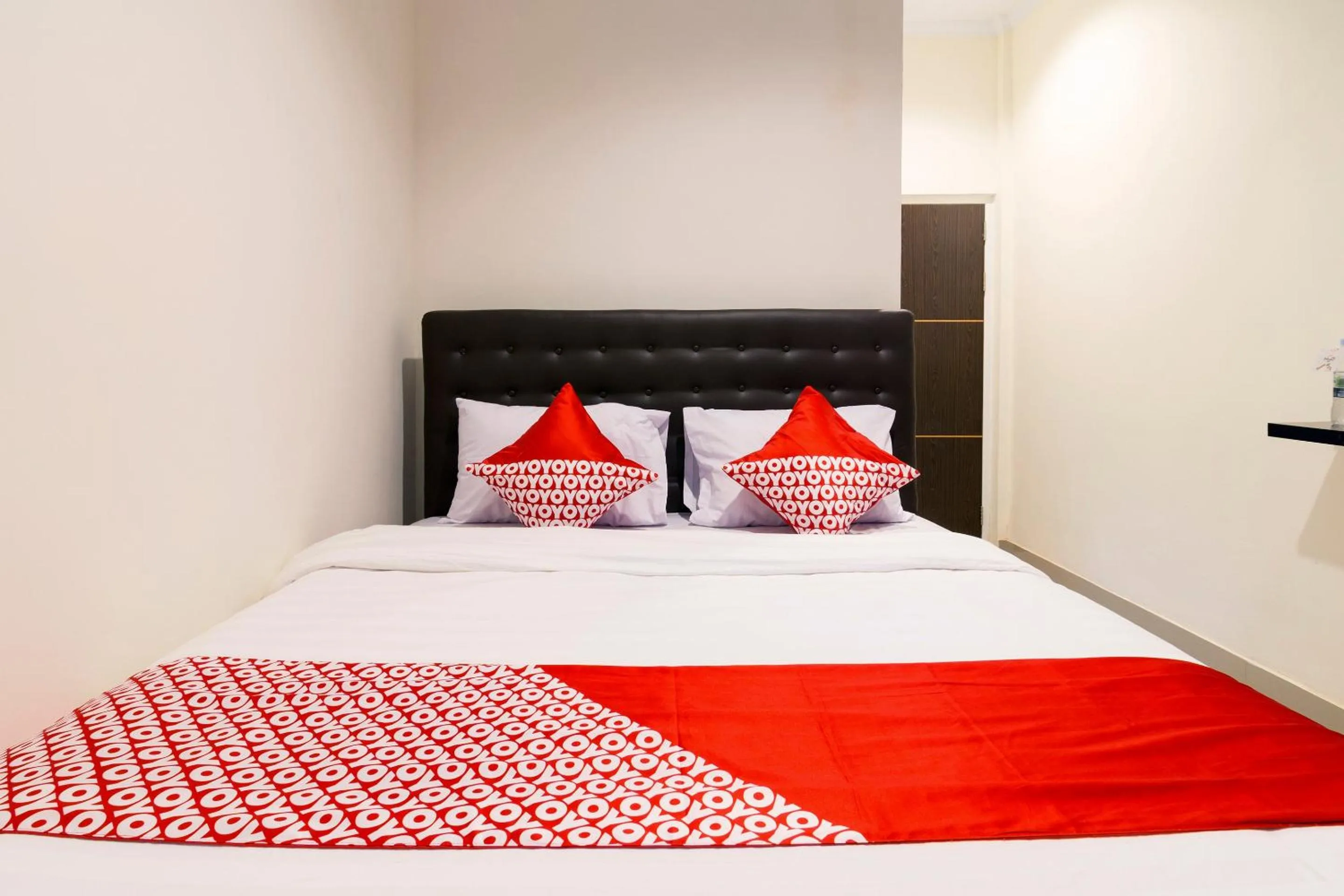 Bedroom in Hotel O Travel-inn