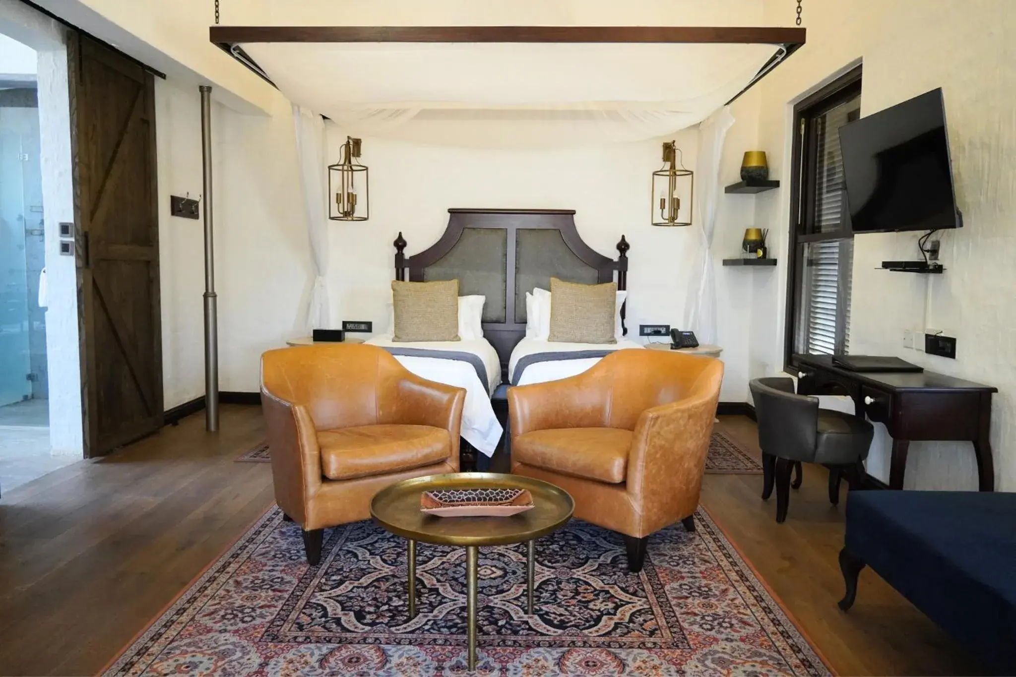 Deluxe Twin Room with Veranda and Forest View - single occupancy in Mbano Manor Hotel Victoria Falls Deluxe Twin Room with Veranda and Forest View - single occupancy in Mbano Manor Hotel Victoria Falls