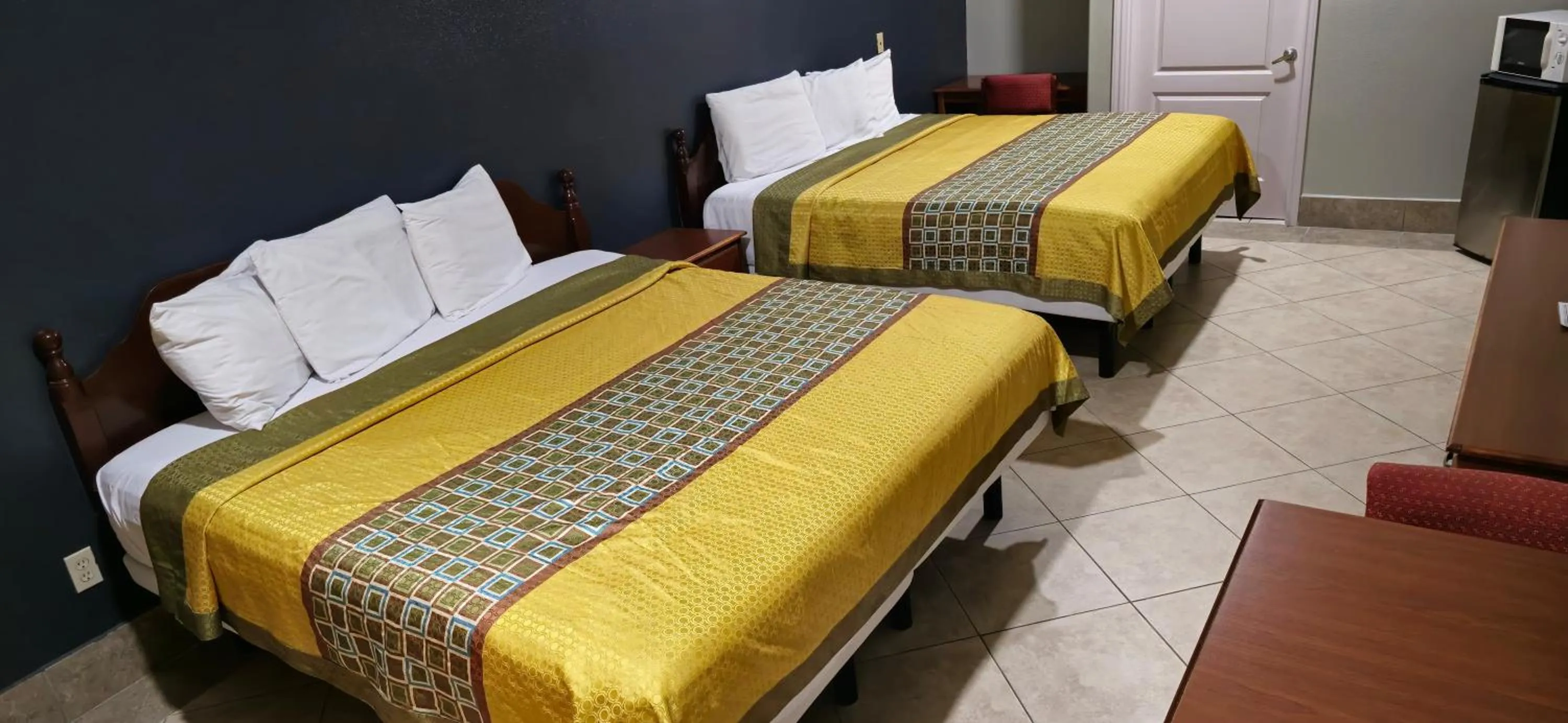 Bed in Texas Inn and Suites RGV