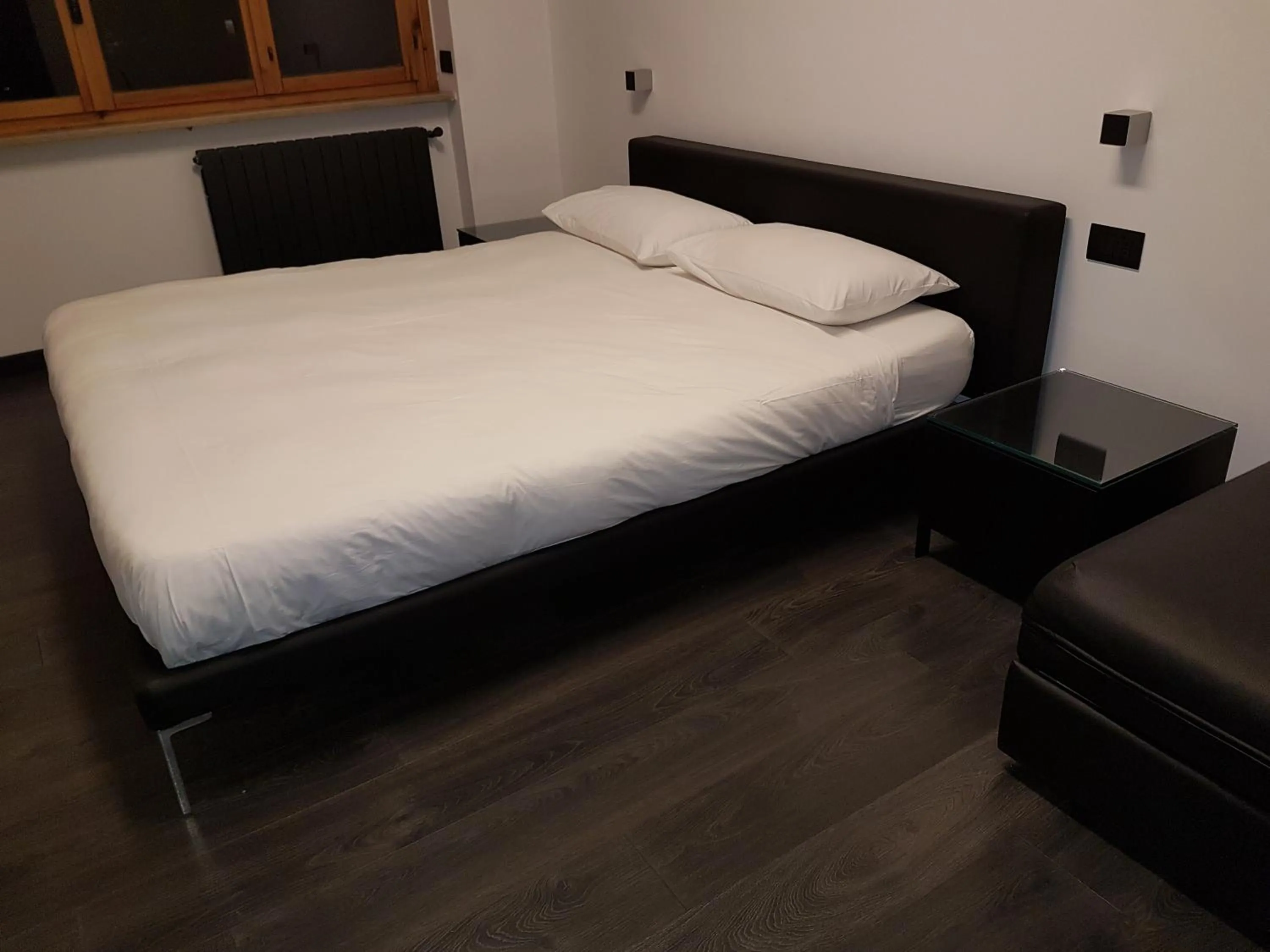 Bed in Cinecittà Luxury GUEST HOUSE