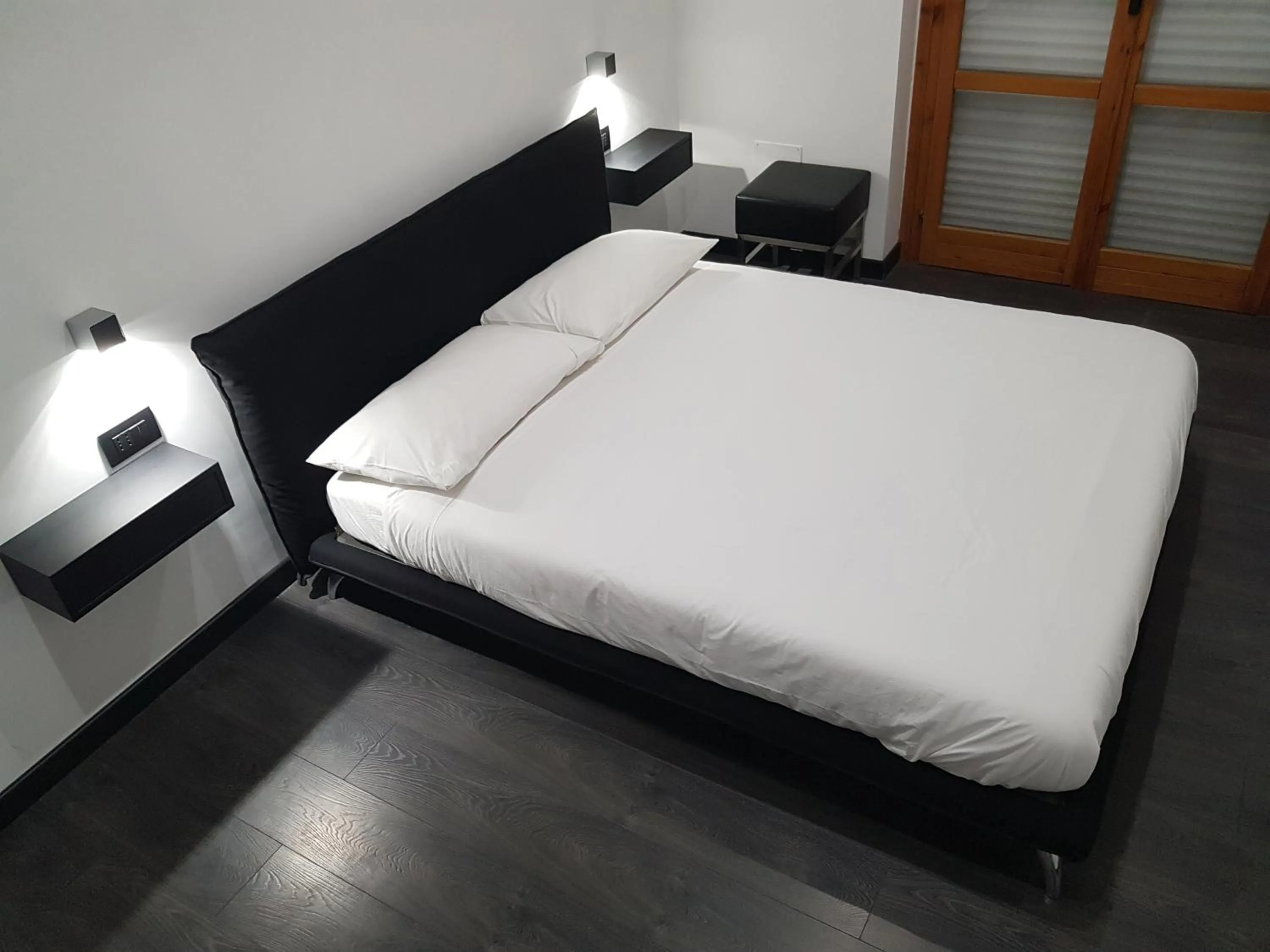 Bed in Cinecittà Luxury GUEST HOUSE