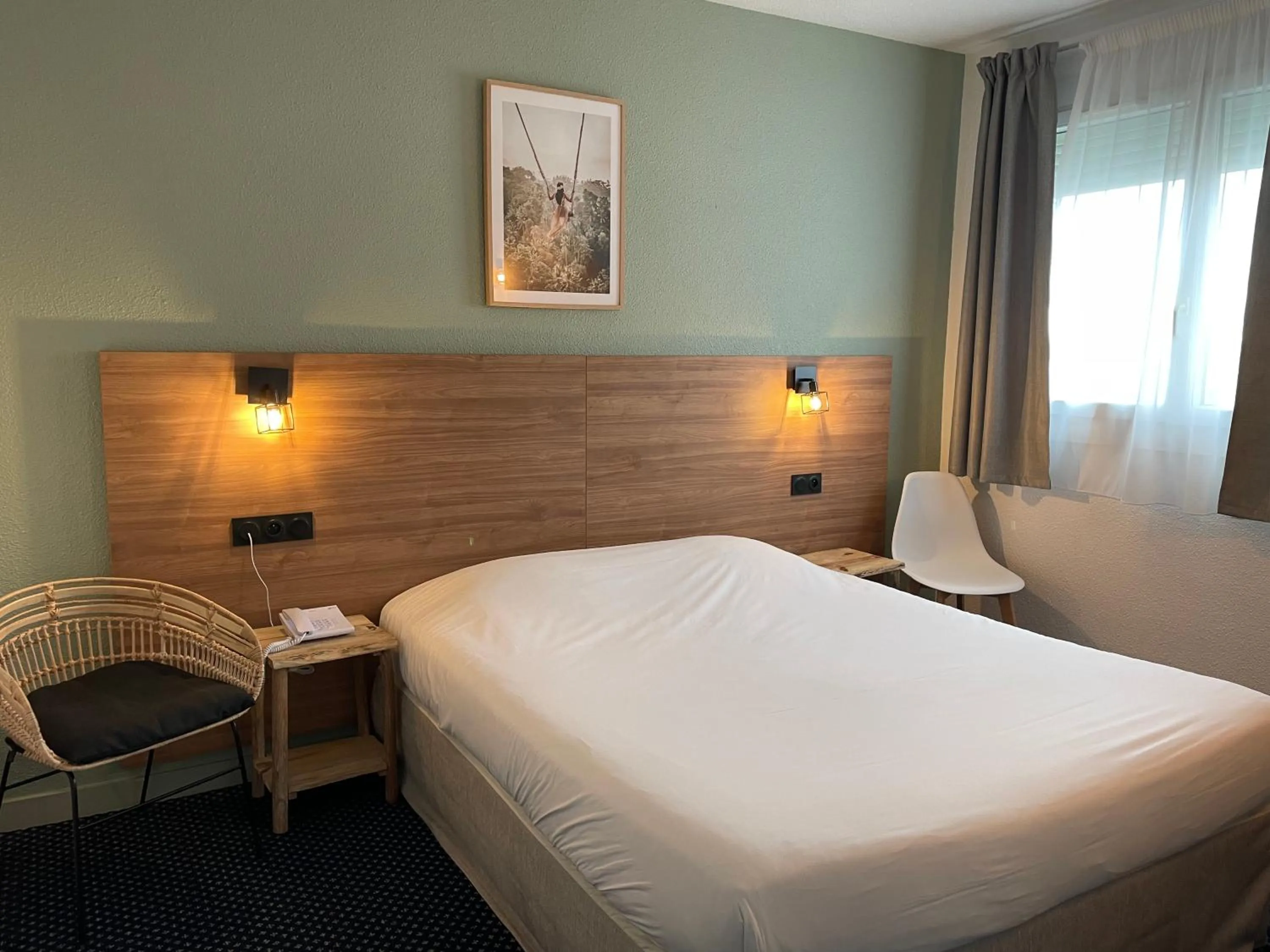 Bed in Hotel Le Progres