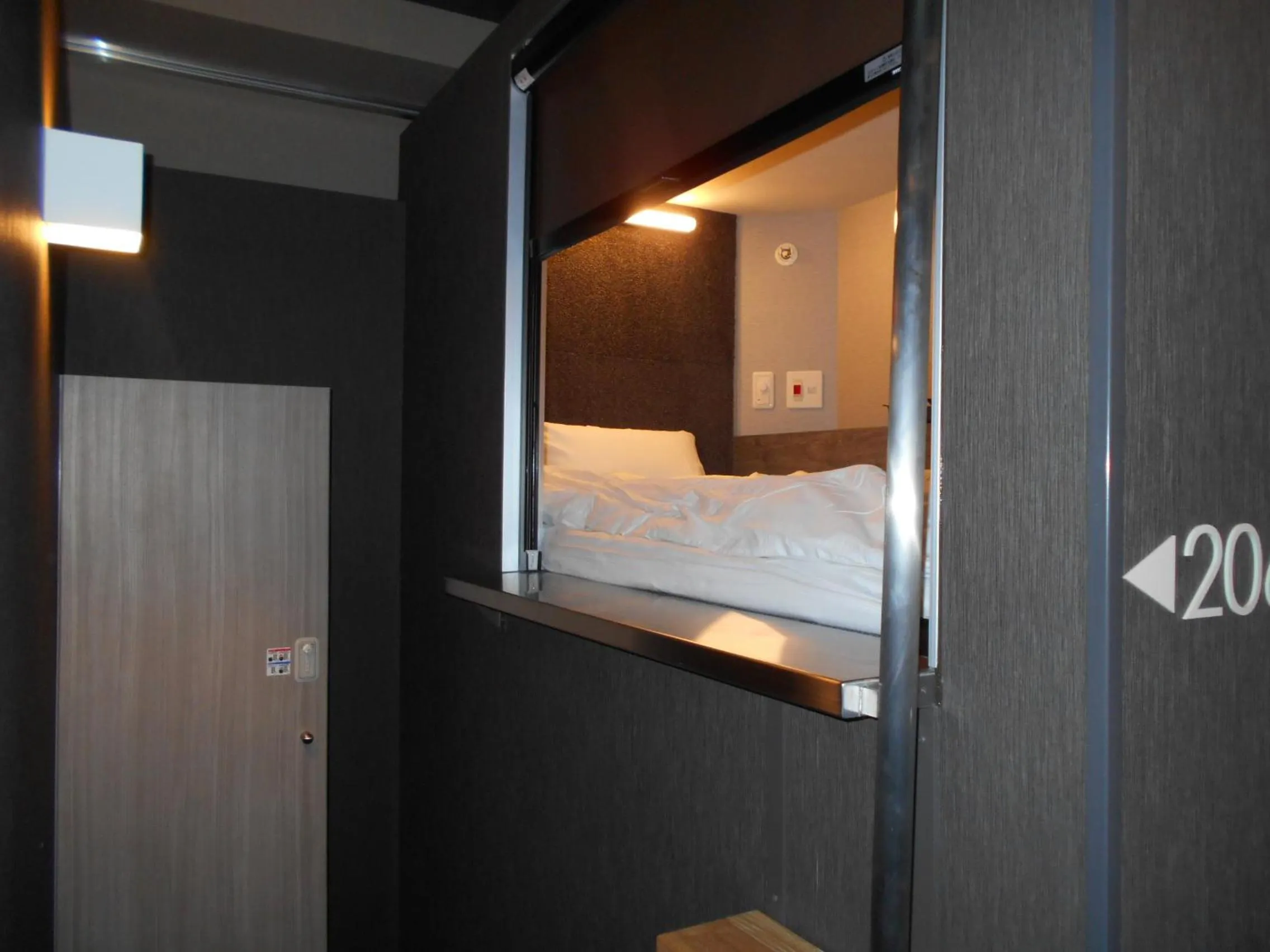 Photo of the whole room, Bed in BIZCOURT CABIN SUSUKINO (Male Only)