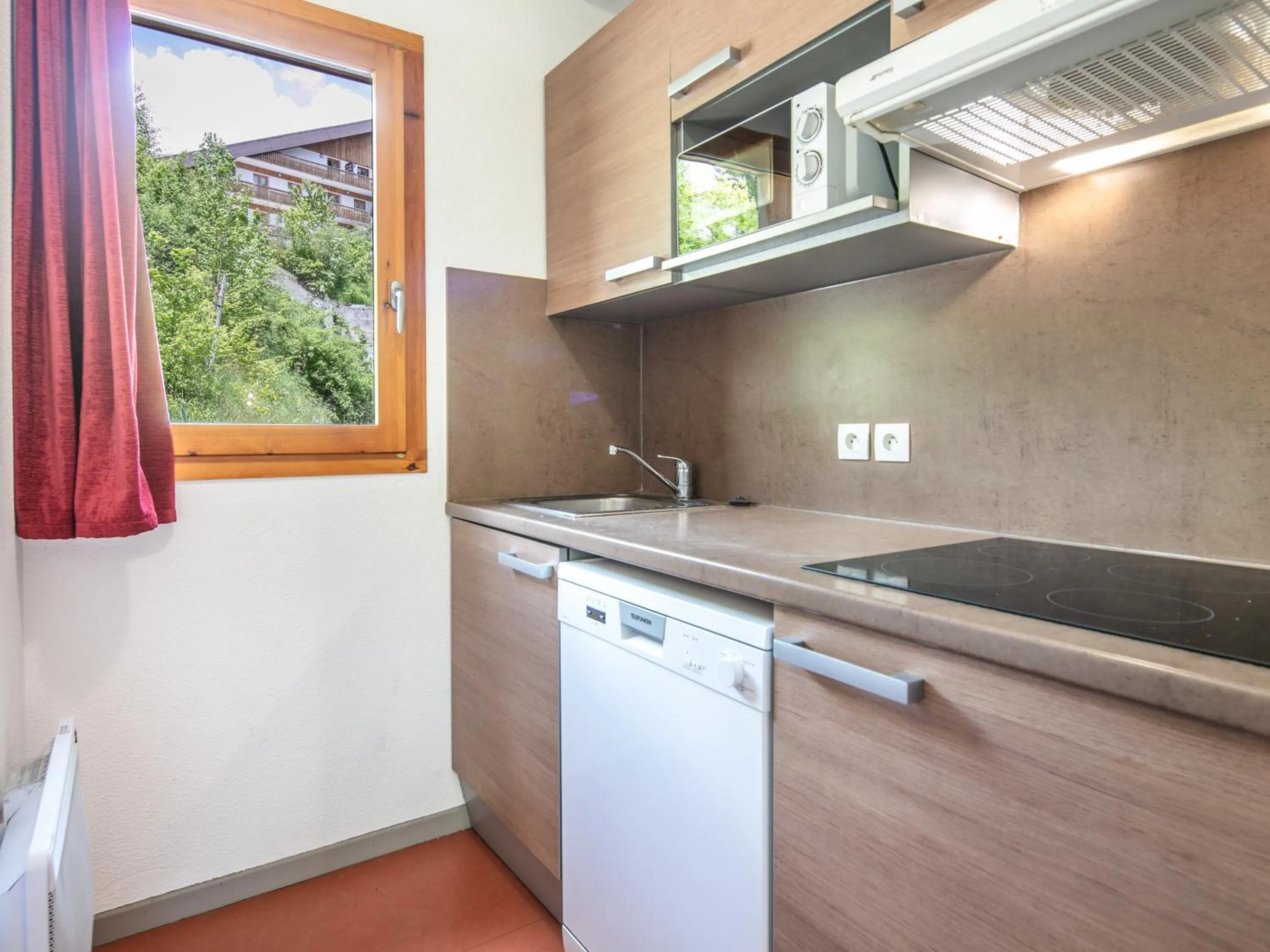 Kitchen or kitchenette in Vacancéole - Les Gentianes