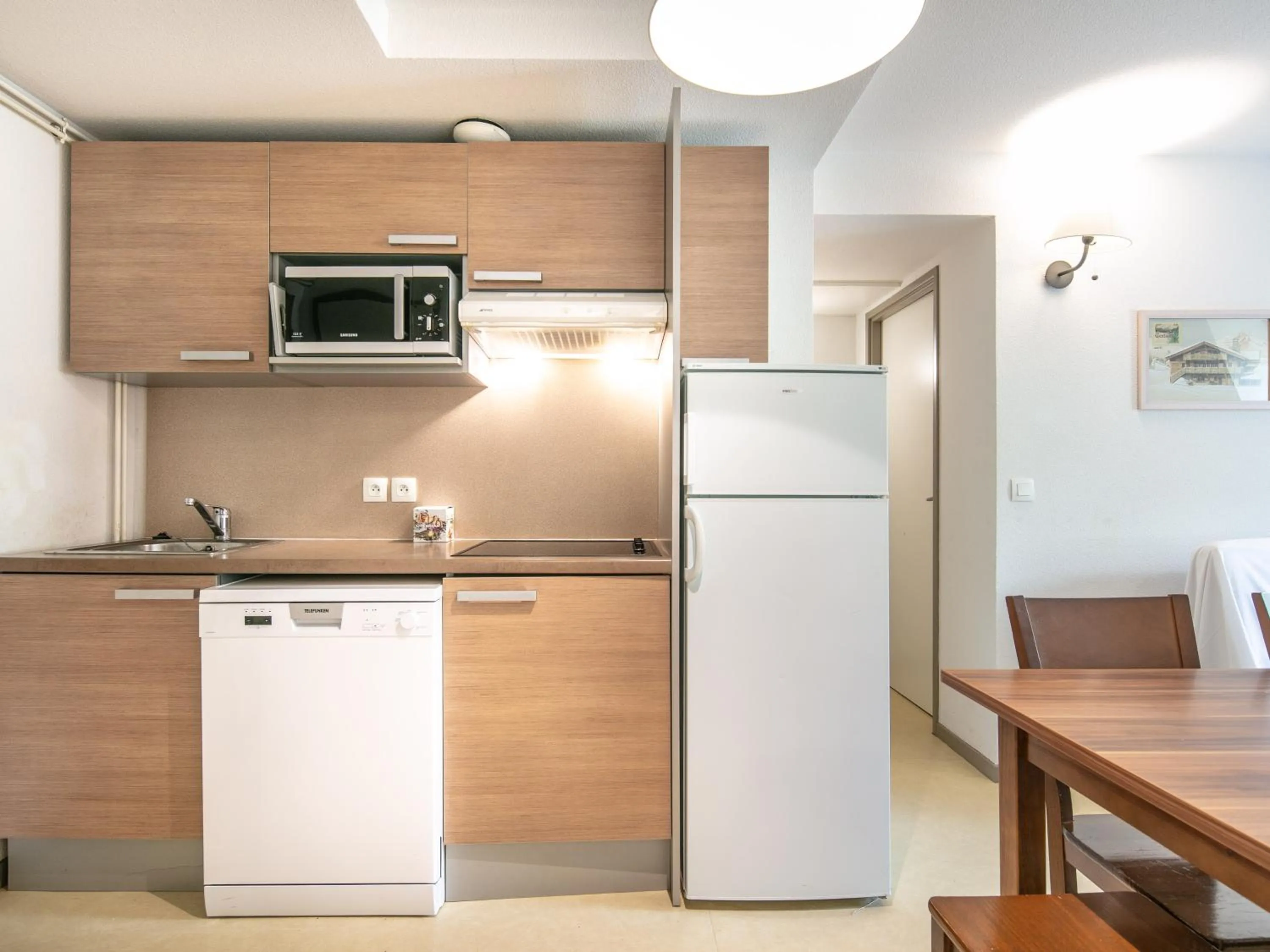 Kitchen or kitchenette in Vacancéole - Les Gentianes