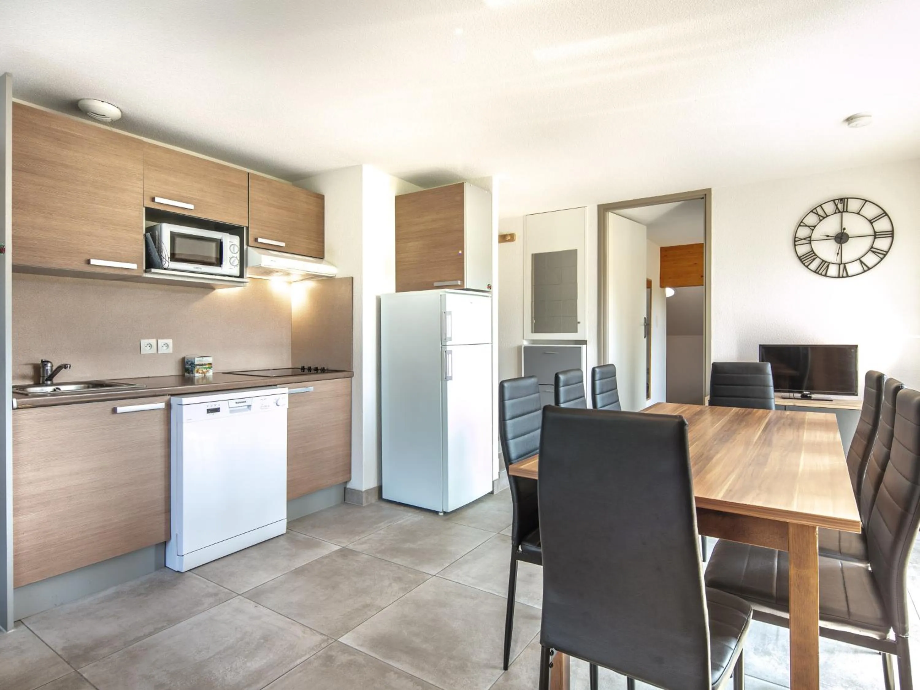 Kitchen or kitchenette in Vacancéole - Les Gentianes