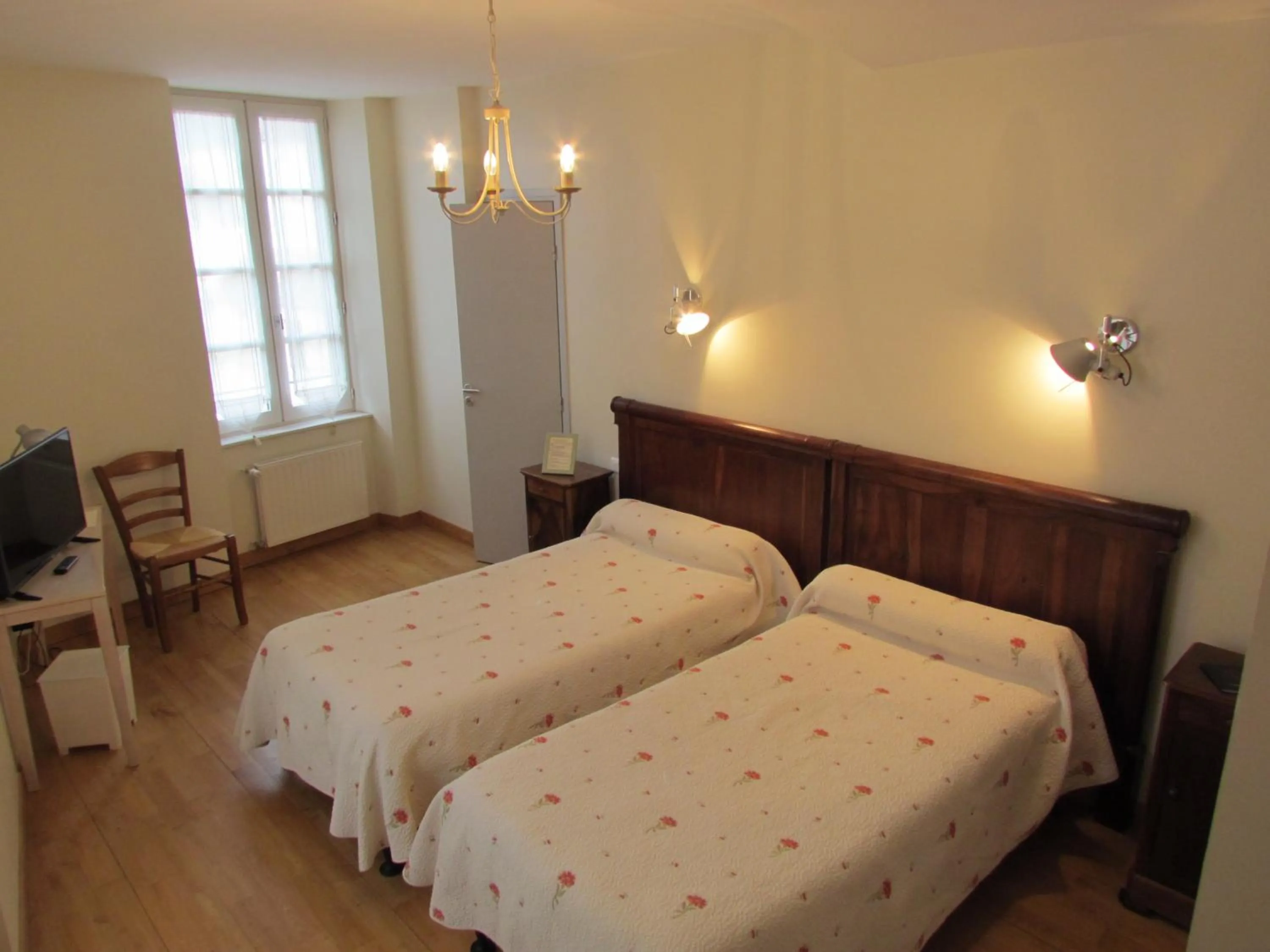 Bed in Le Relais de la Tour