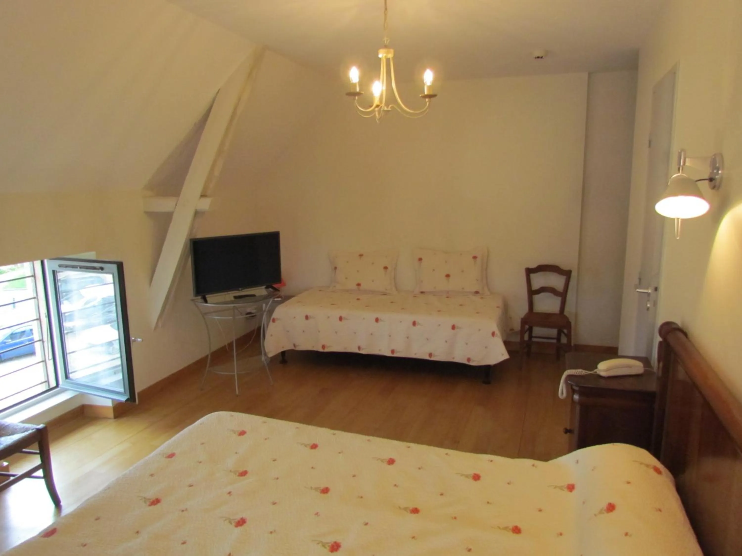 Bed in Le Relais de la Tour