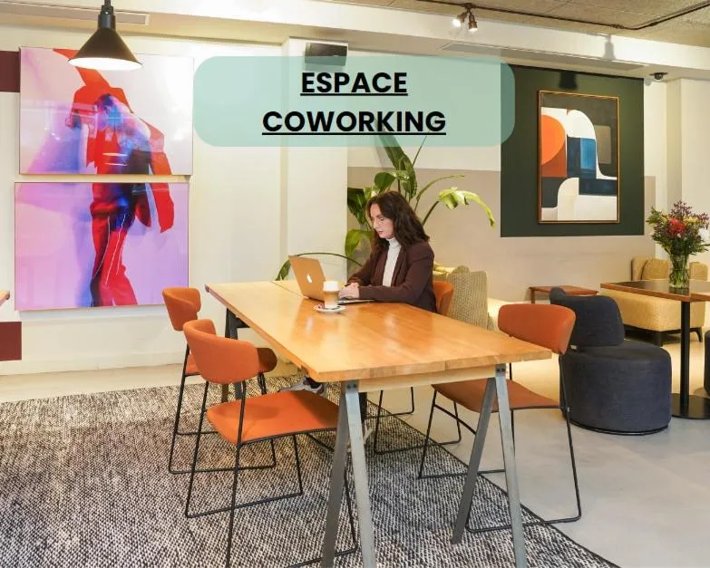 Communal lounge/ TV room in Le Grand Quartier