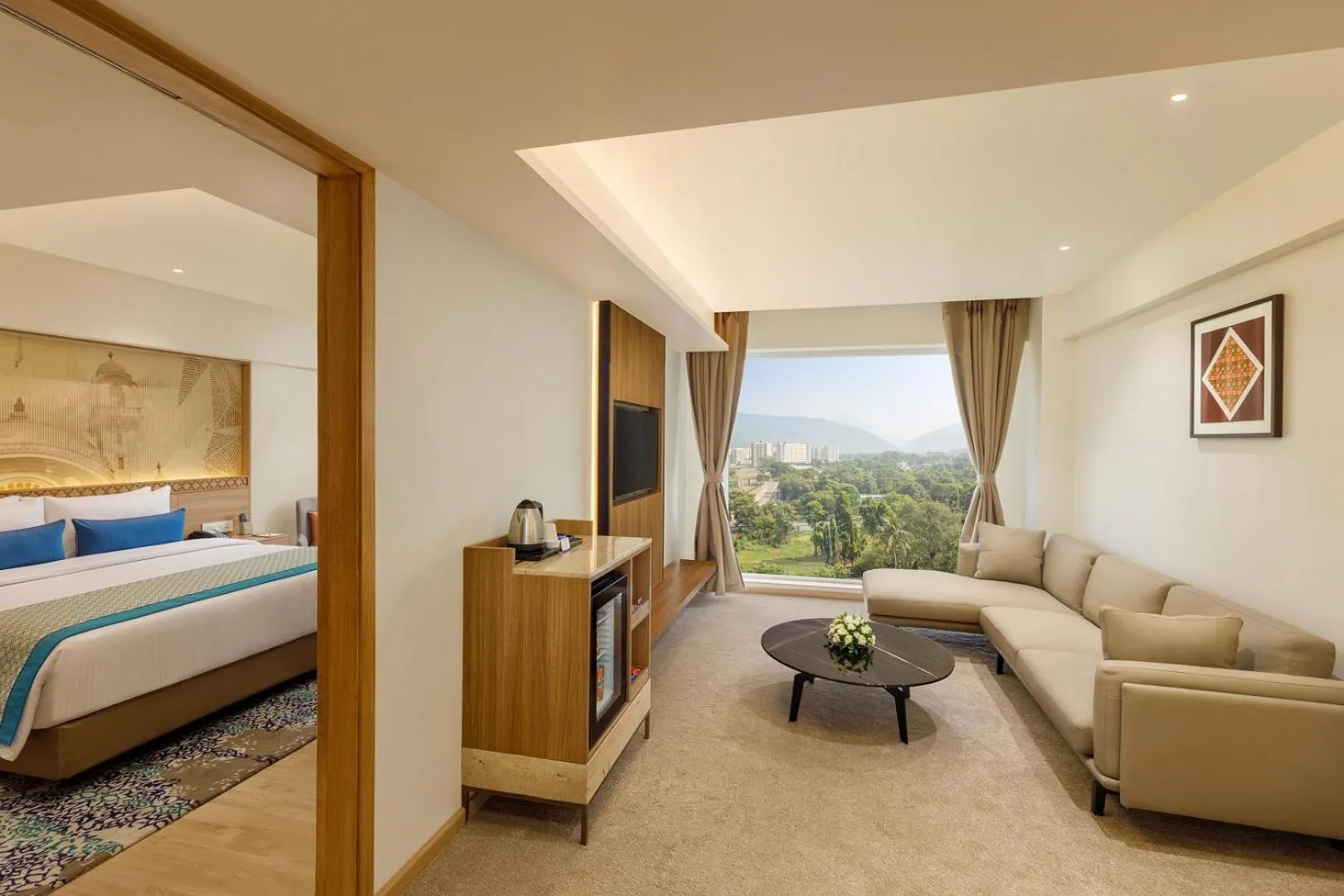 Living room, Bed in Bellevue Sarovar Premiere Junagadh