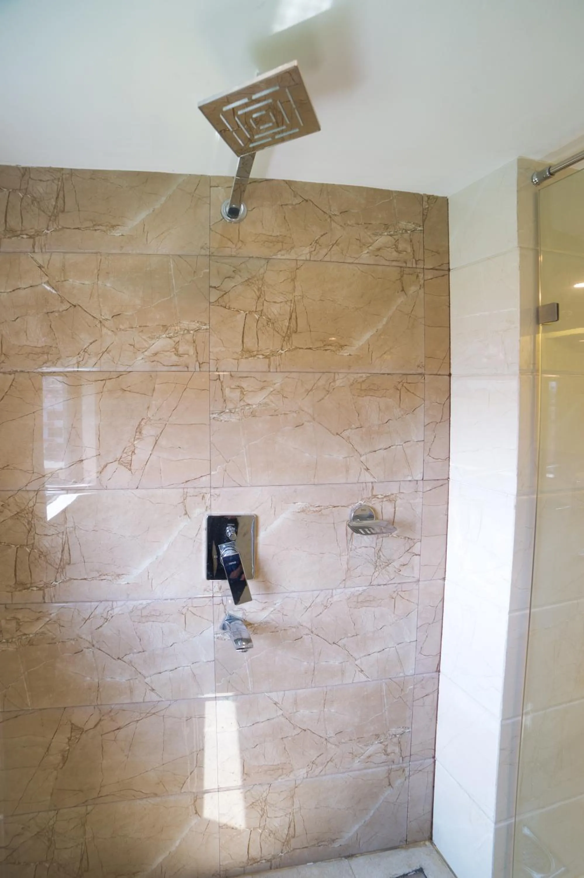 Shower in Ganapati Airport Hotel