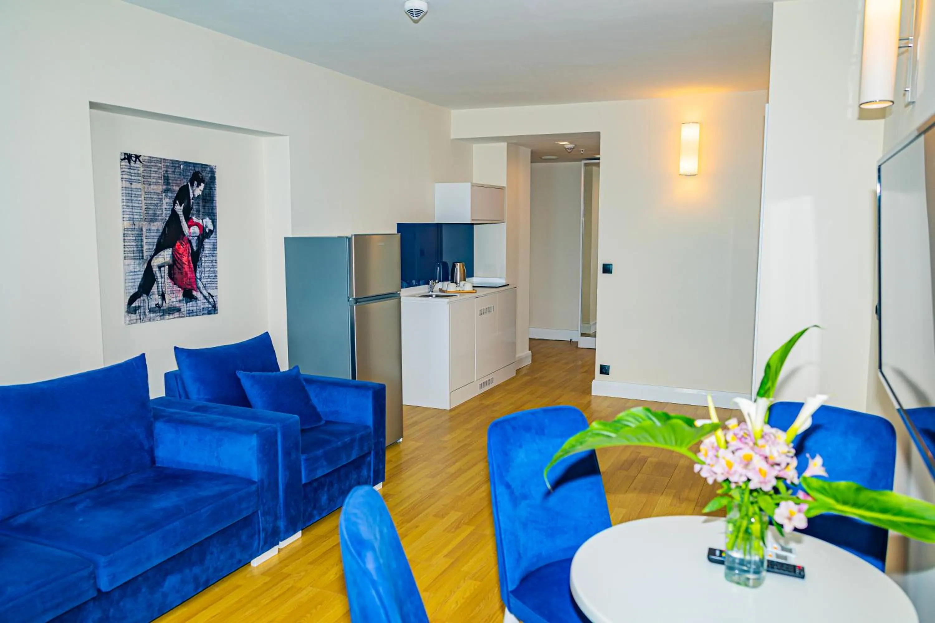 Communal lounge/ TV room, Seating Area in Orbi City Inn