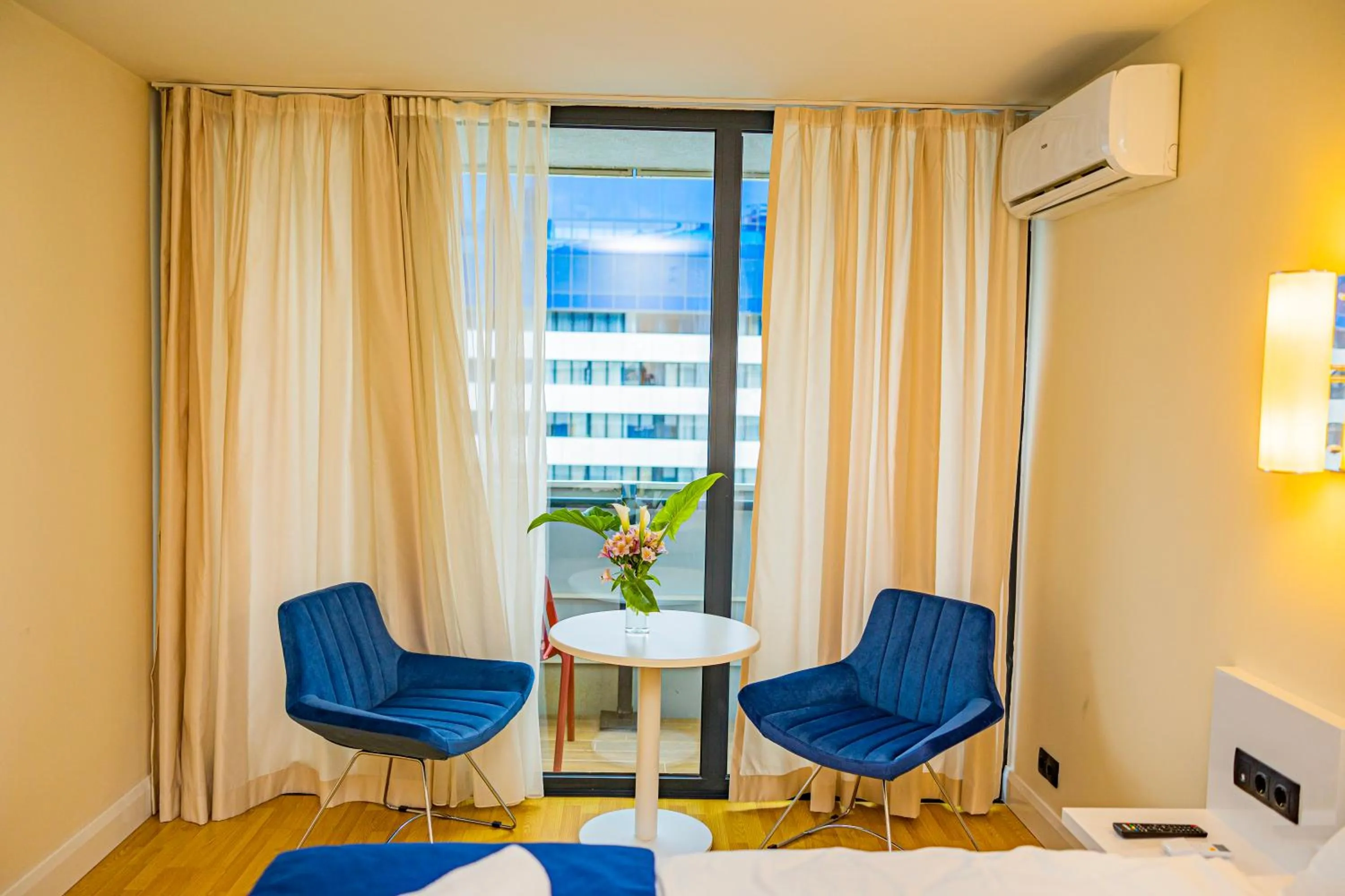 TV and multimedia, Seating Area in Orbi City Inn