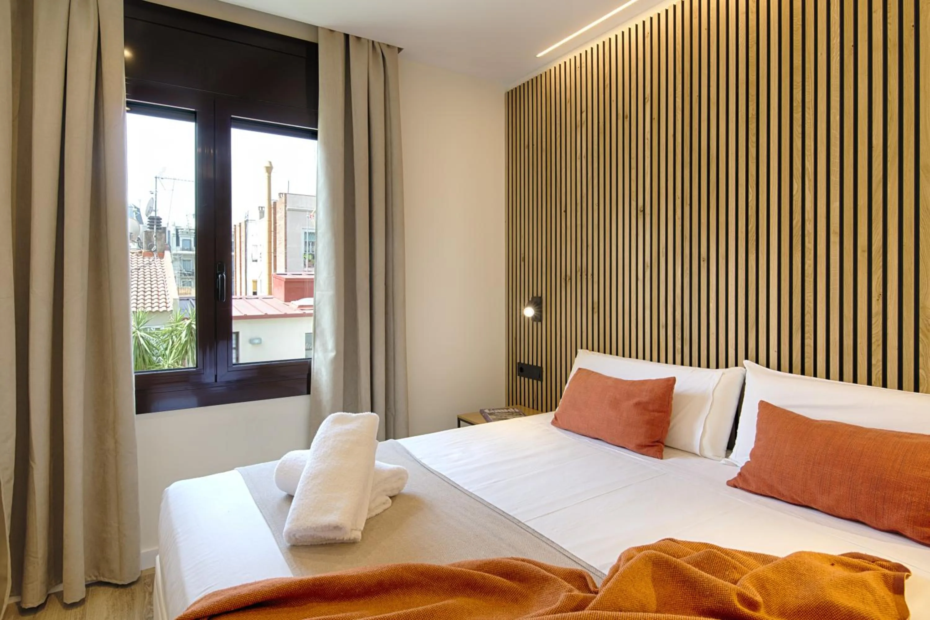 Bed in Eixample Building Apartments by Mercedes Heritage