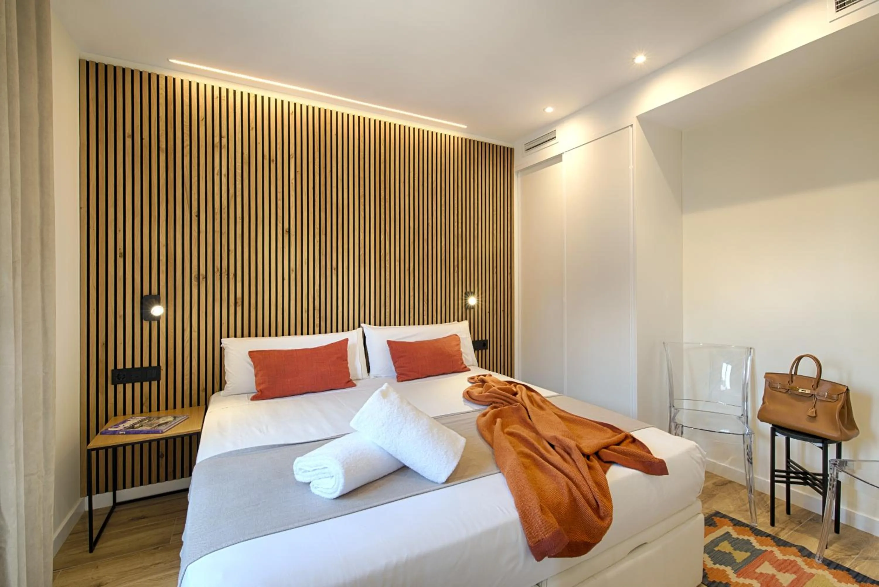 Bed in Eixample Building Apartments by Mercedes Heritage