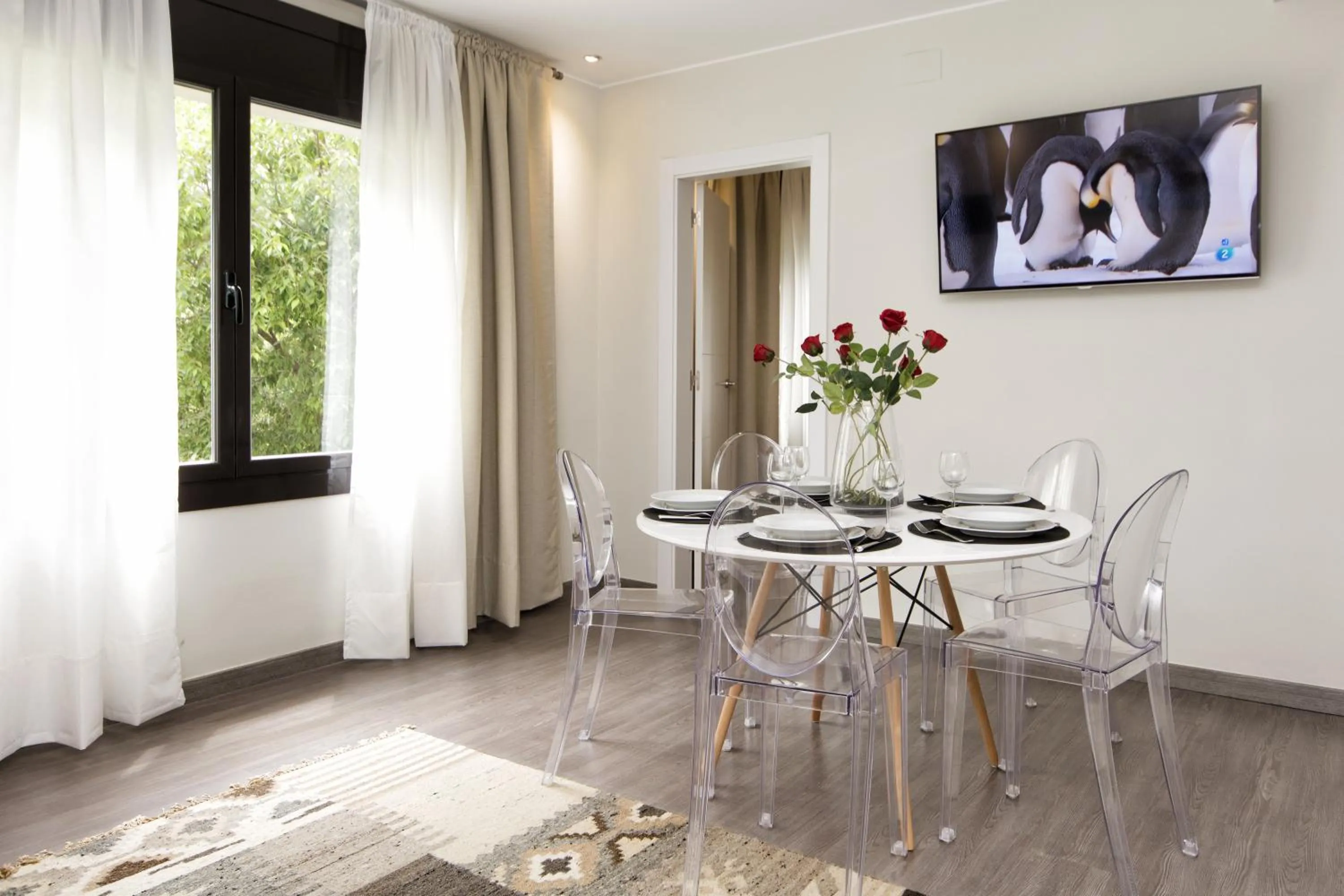 TV and multimedia in Eixample Building Apartments by Mercedes Heritage