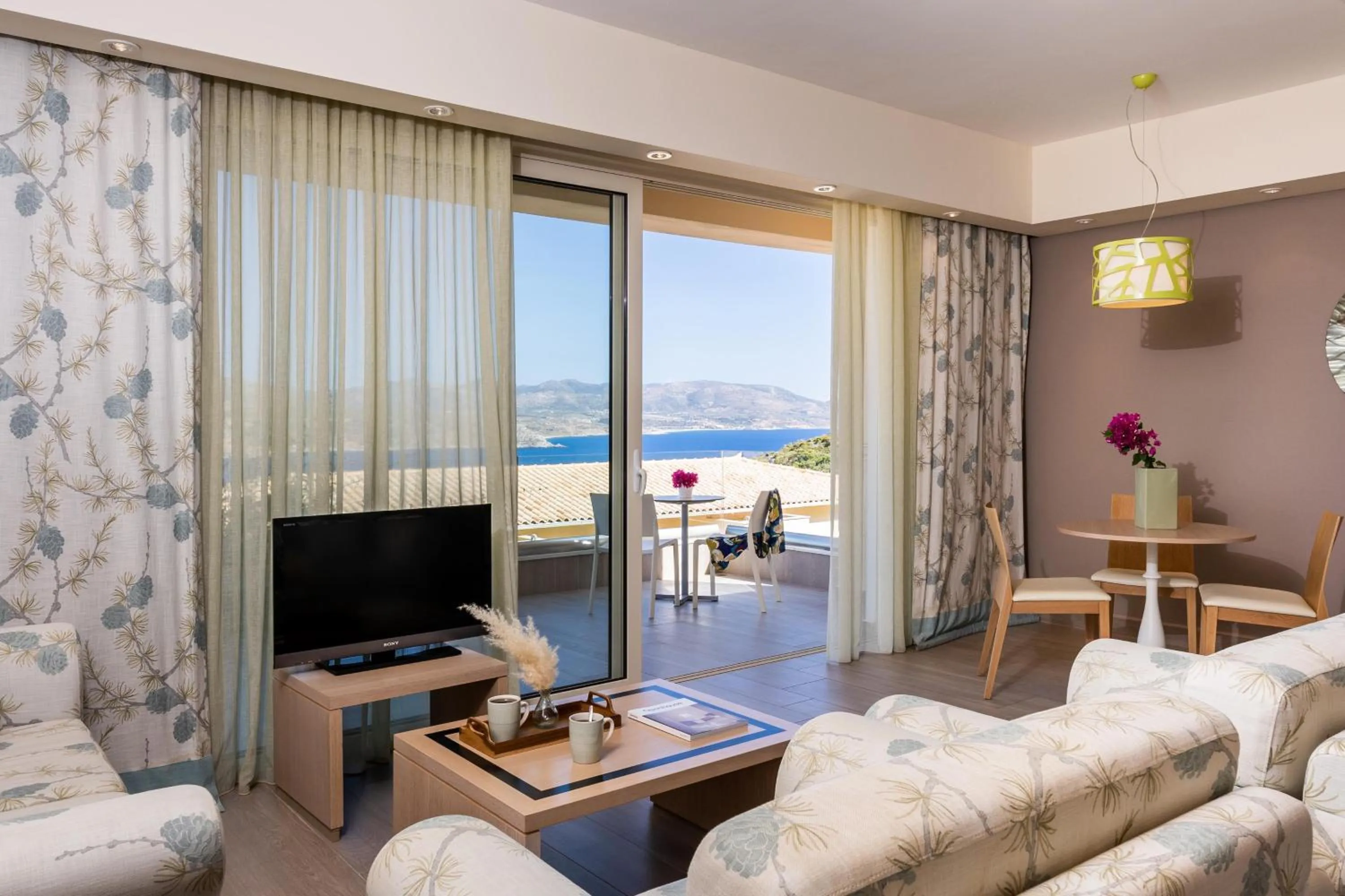 Communal lounge/ TV room in Princess Kyniska Suites