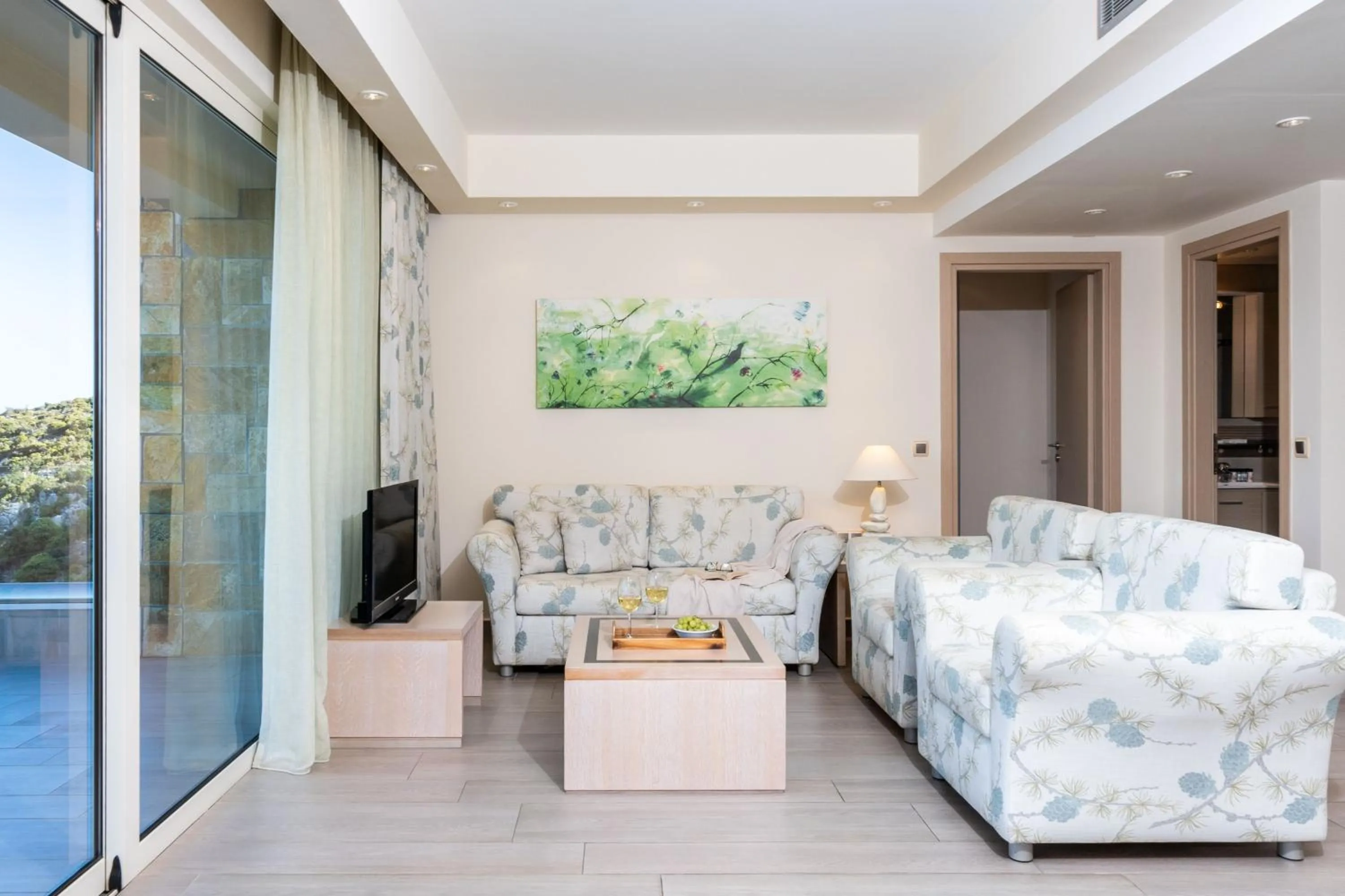 Living room, Bed in Princess Kyniska Suites