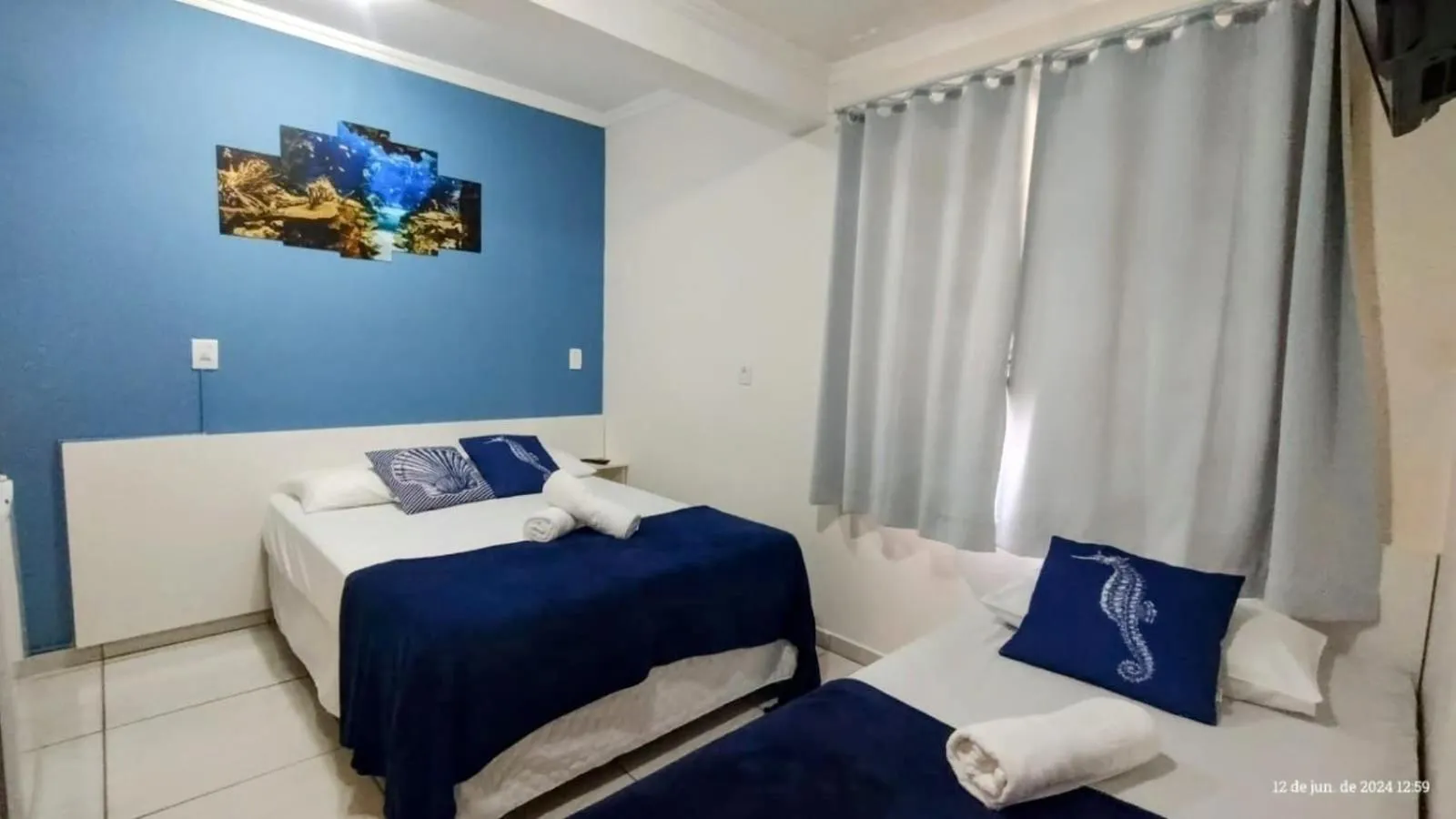 Photo of the whole room, Bed in Pousada Baía dos Corais