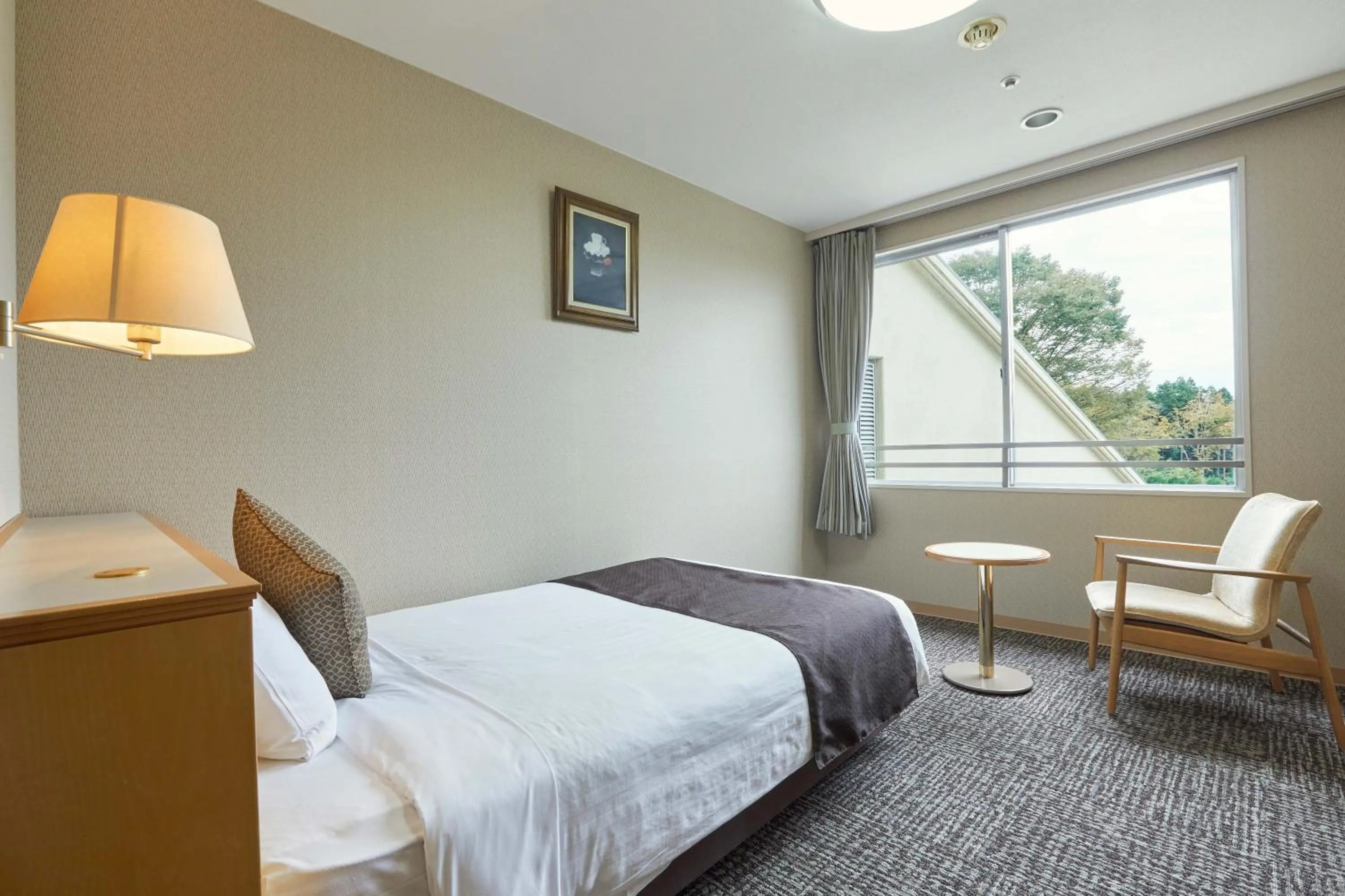 Photo of the whole room, Bed in KAMENOI HOTEL Kitsuregawa