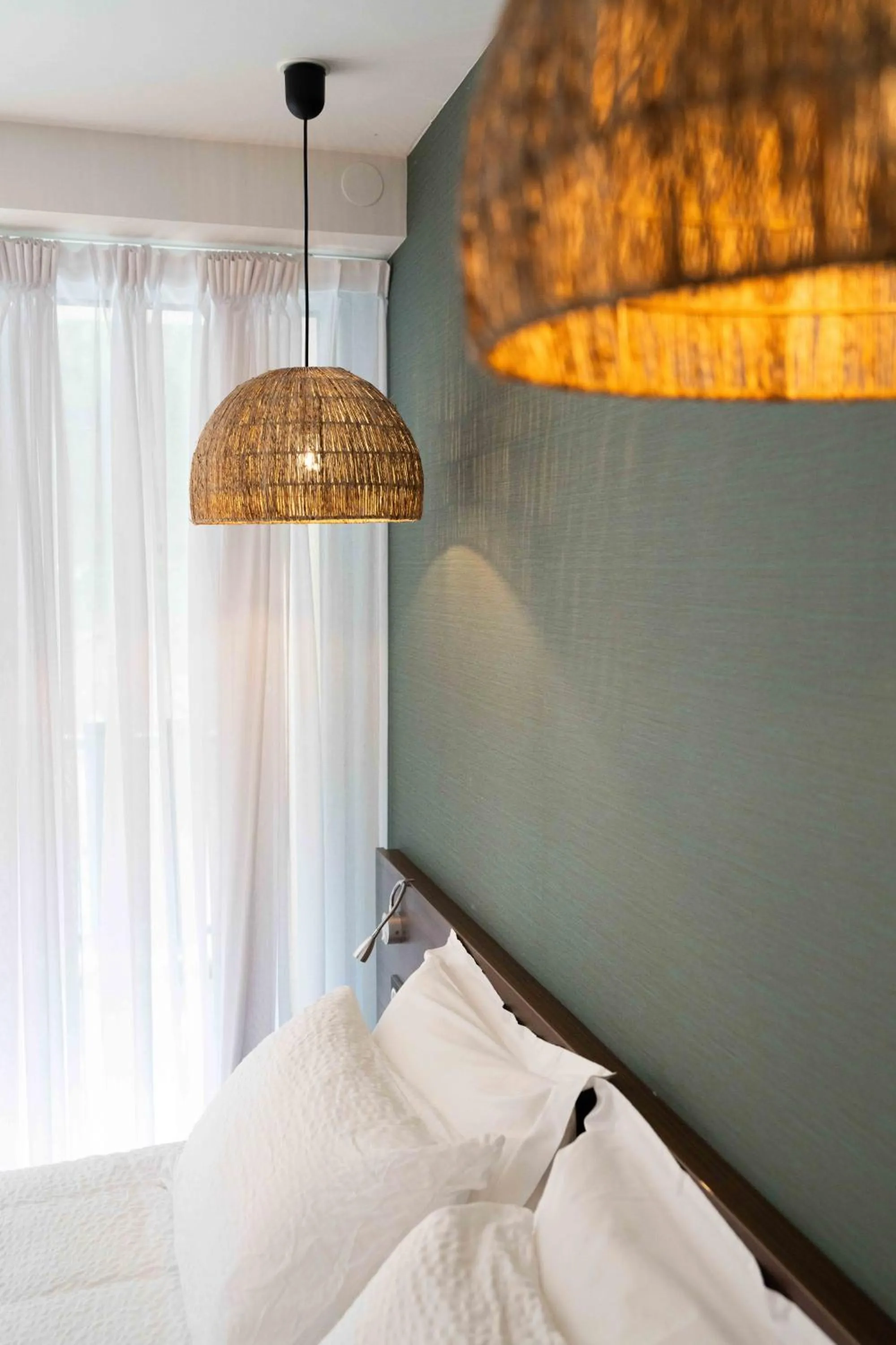 Bed in Hotel Logis Lacotel