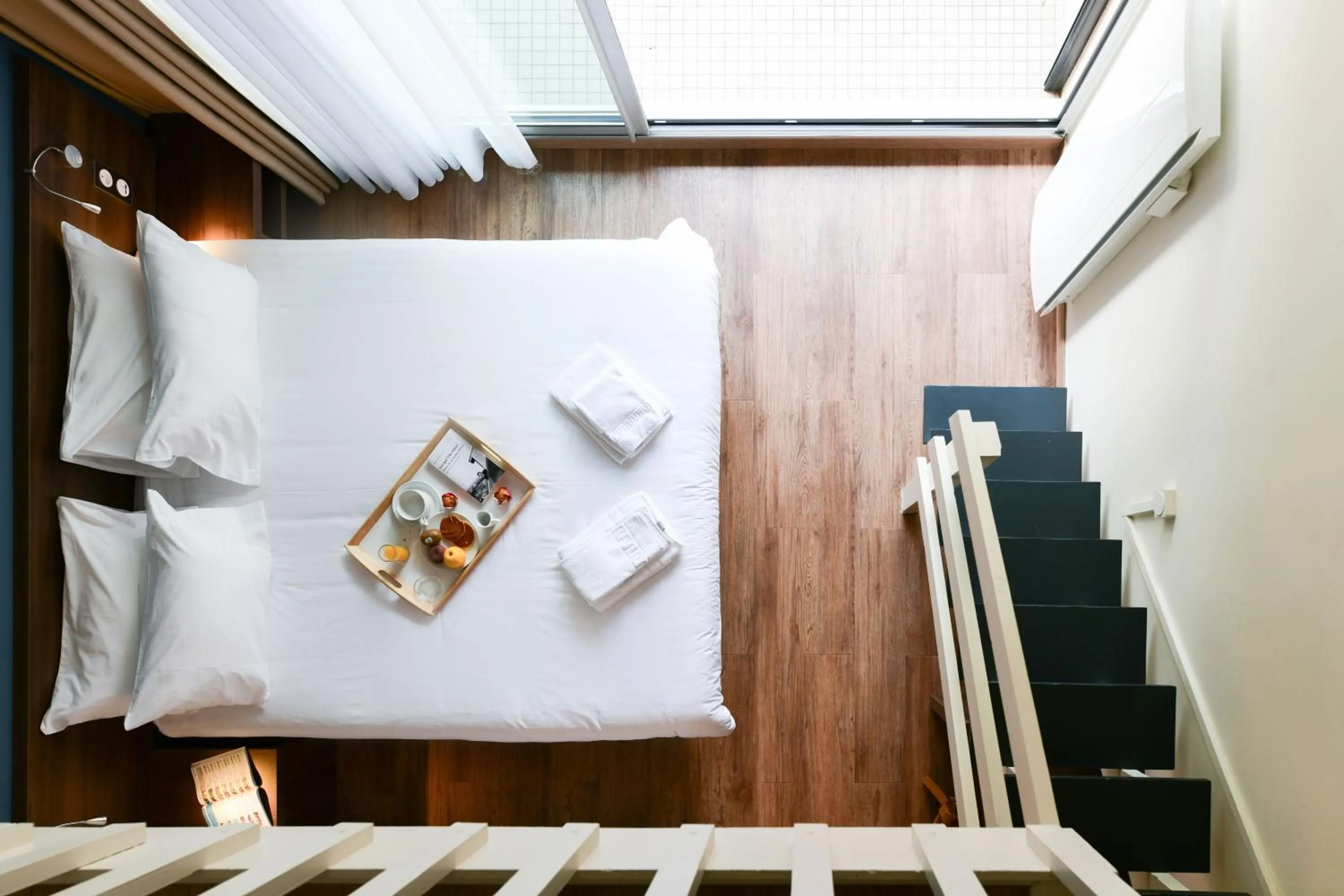 Bed in Hotel Logis Lacotel