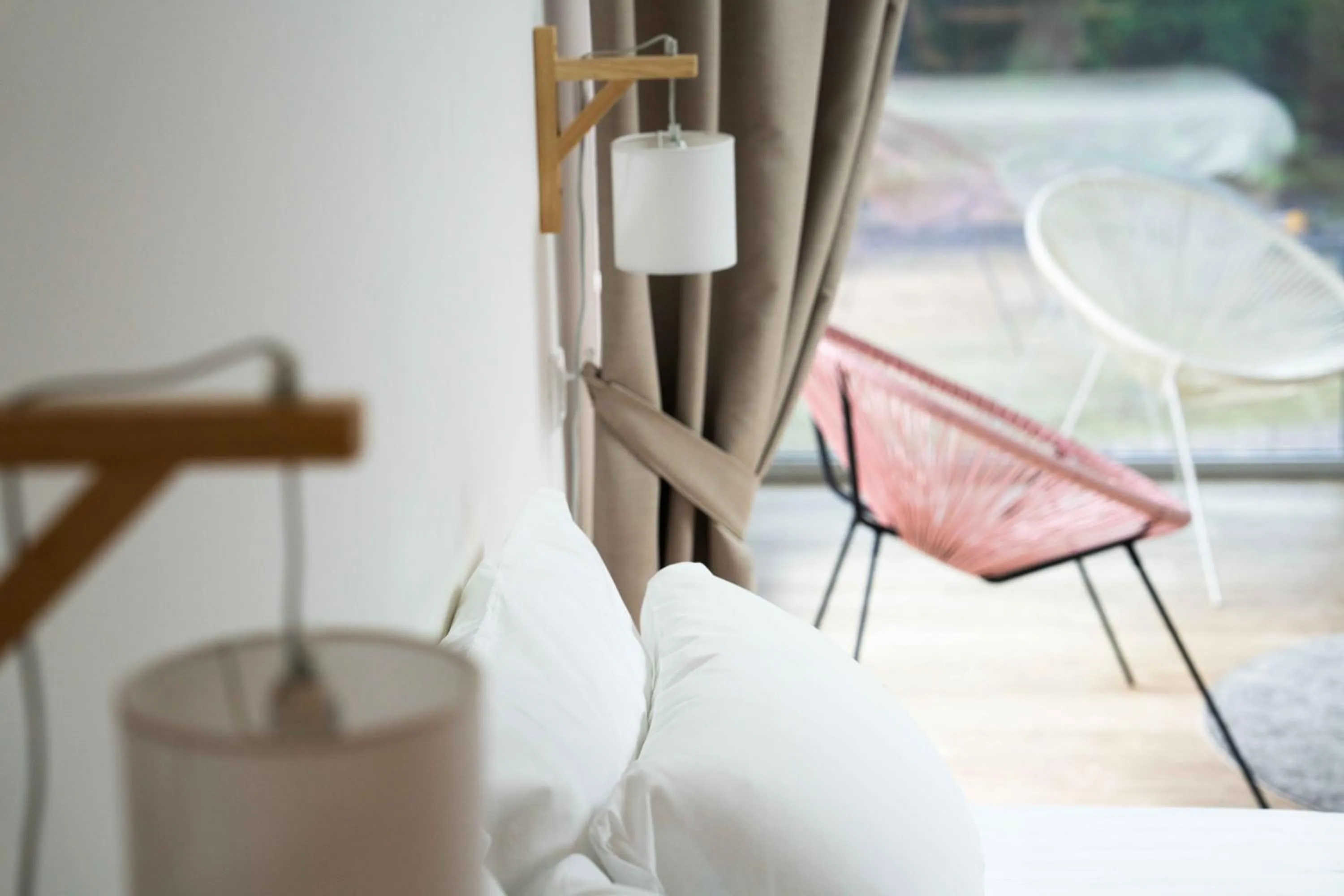 Bed in Hotel Logis Lacotel