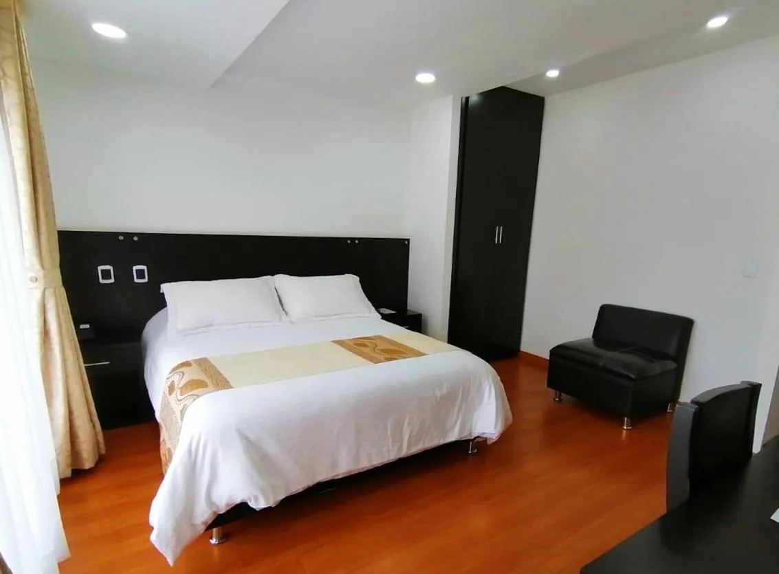 Bed in Hotel Palermo Suite