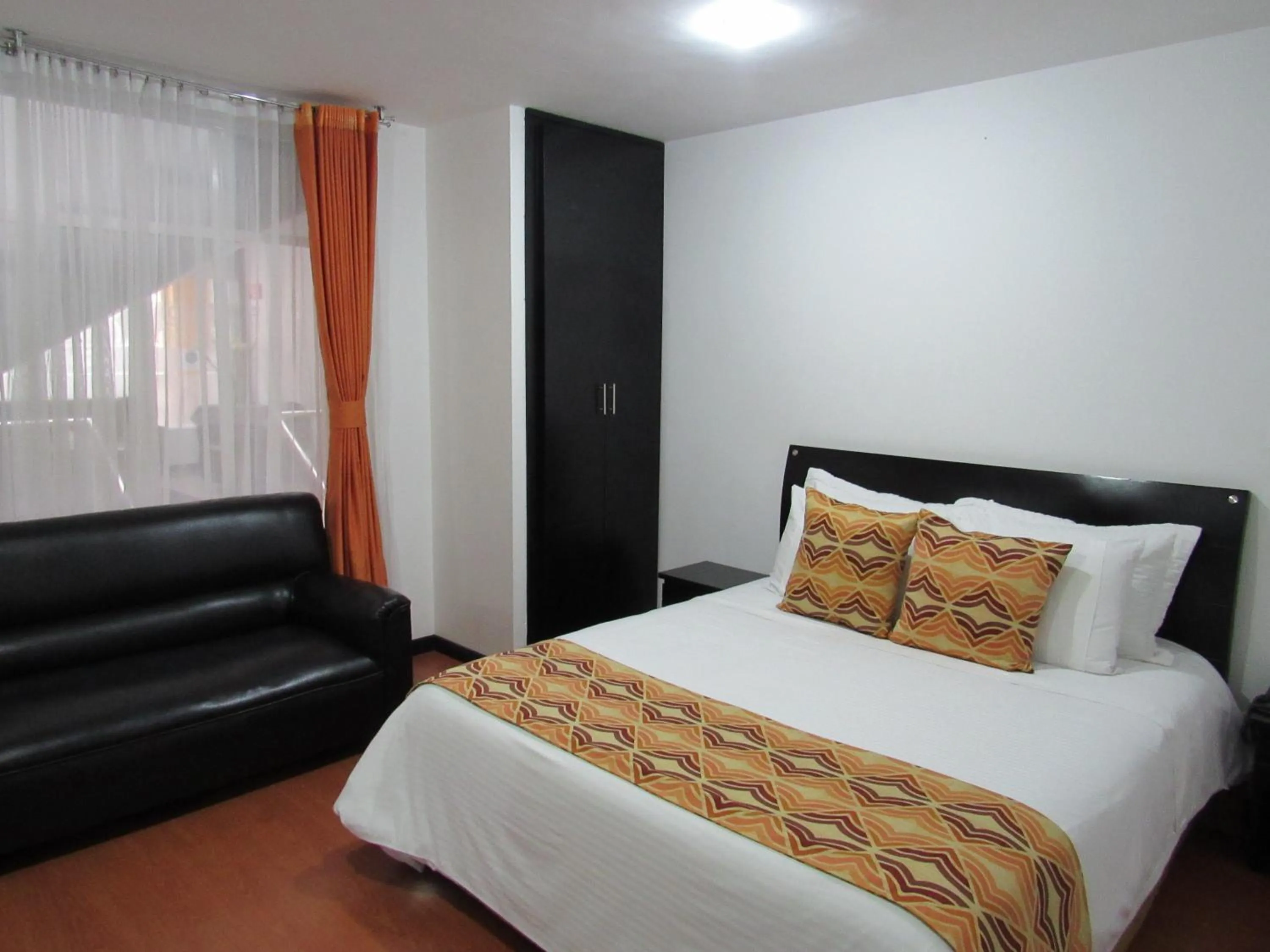 Bed in Hotel Palermo Suite