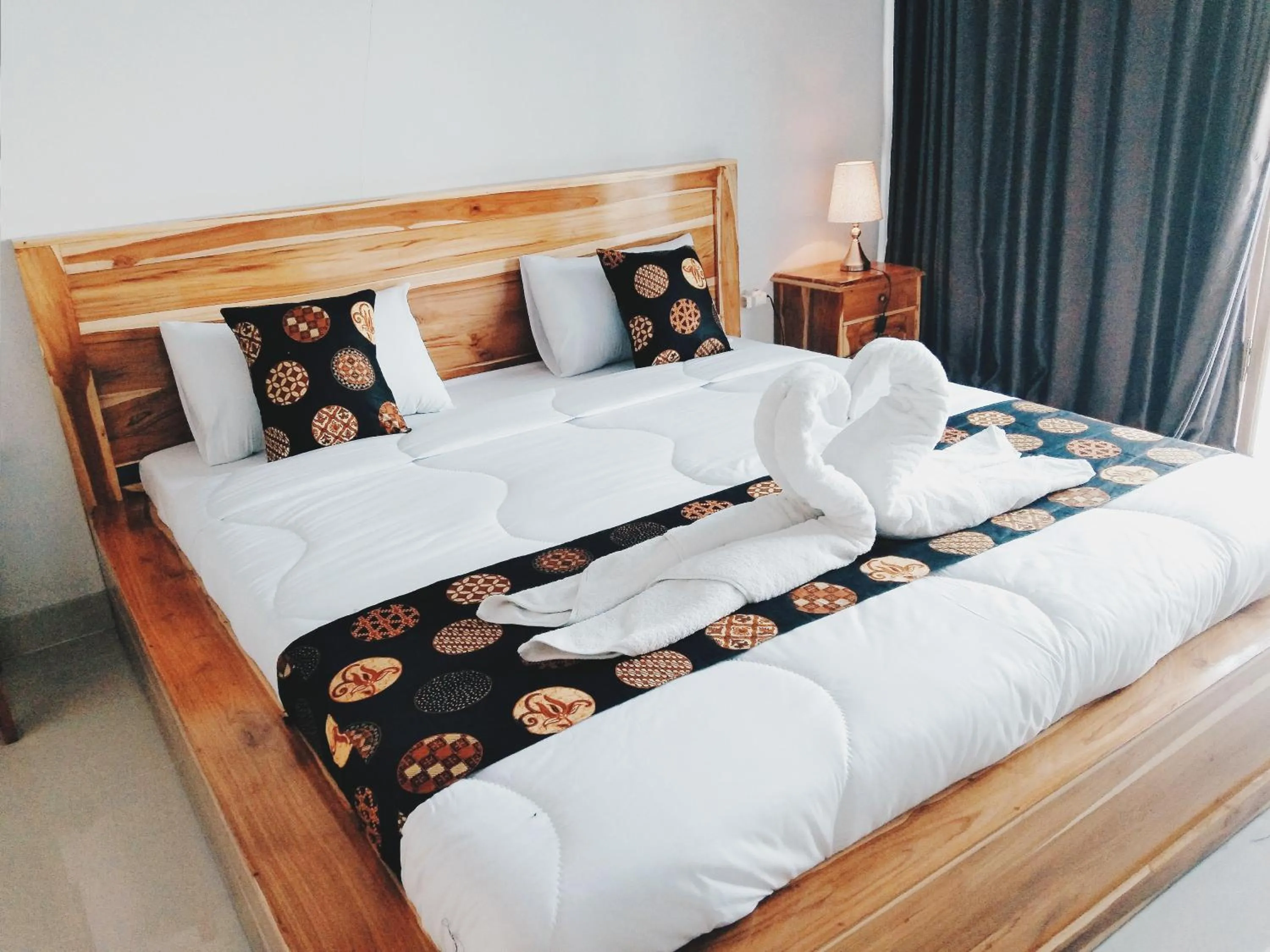 Bed in Batur Pyramid Guesthouse