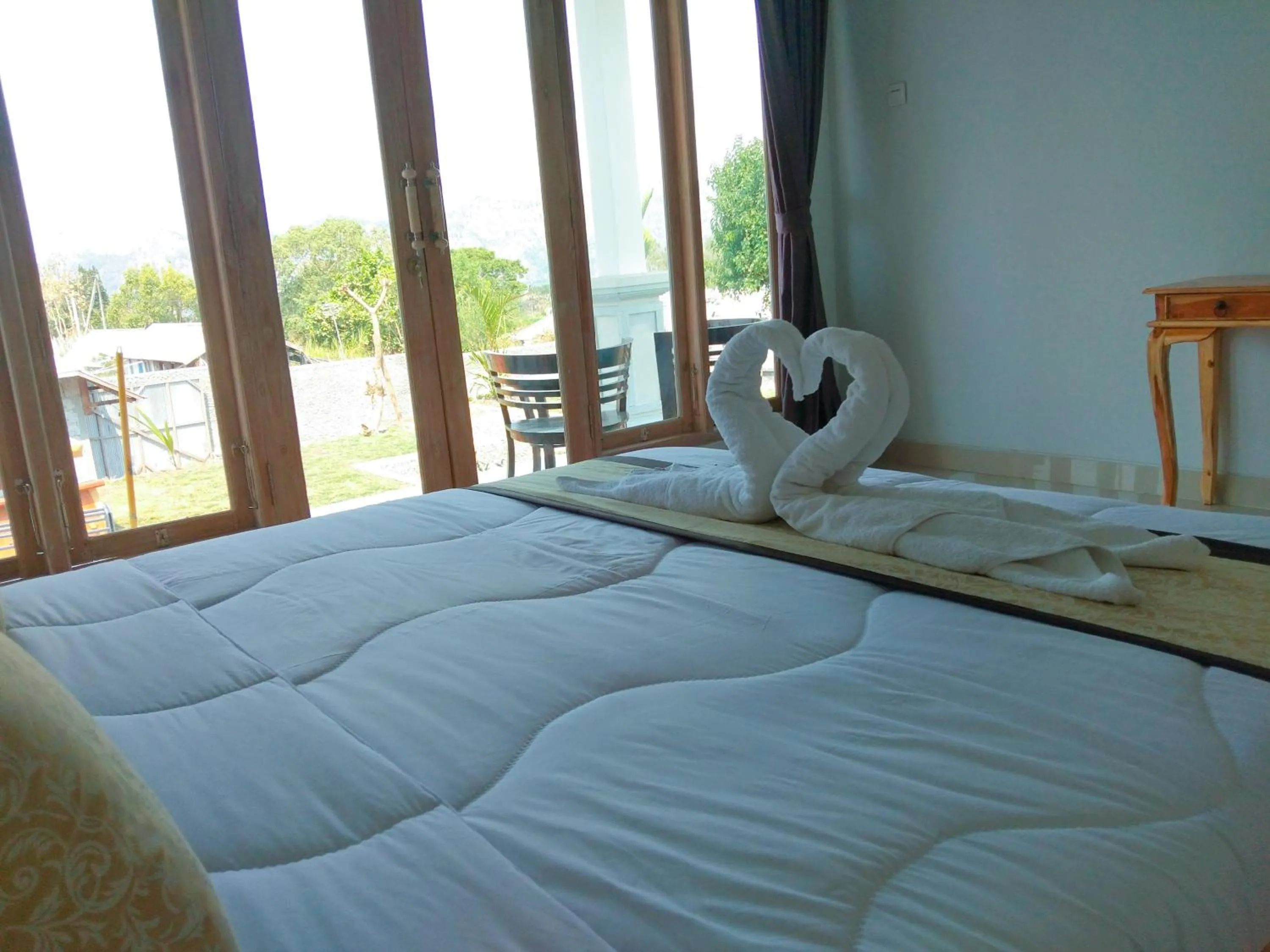 Bed in Batur Pyramid Guesthouse