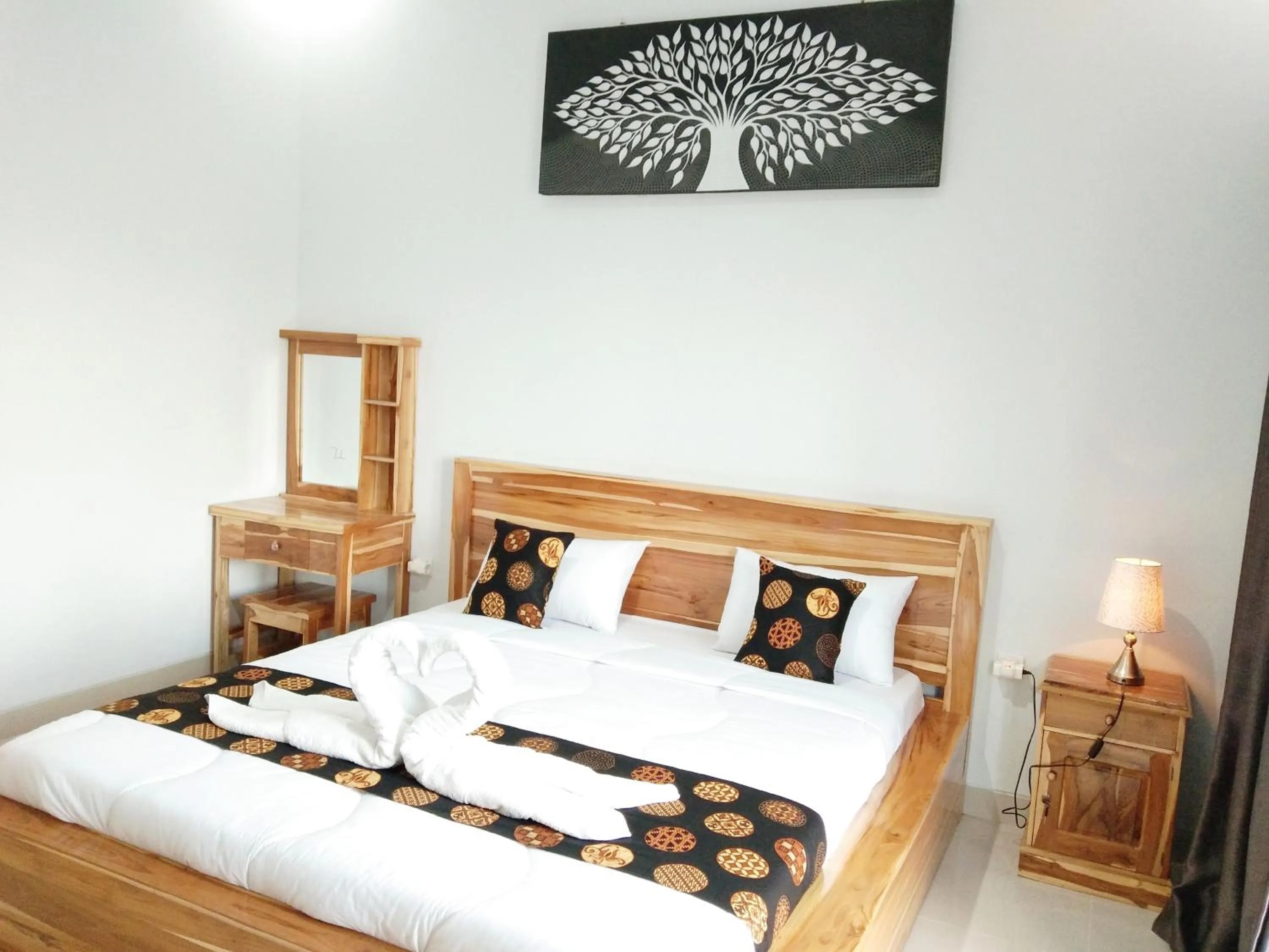 Bed in Batur Pyramid Guesthouse