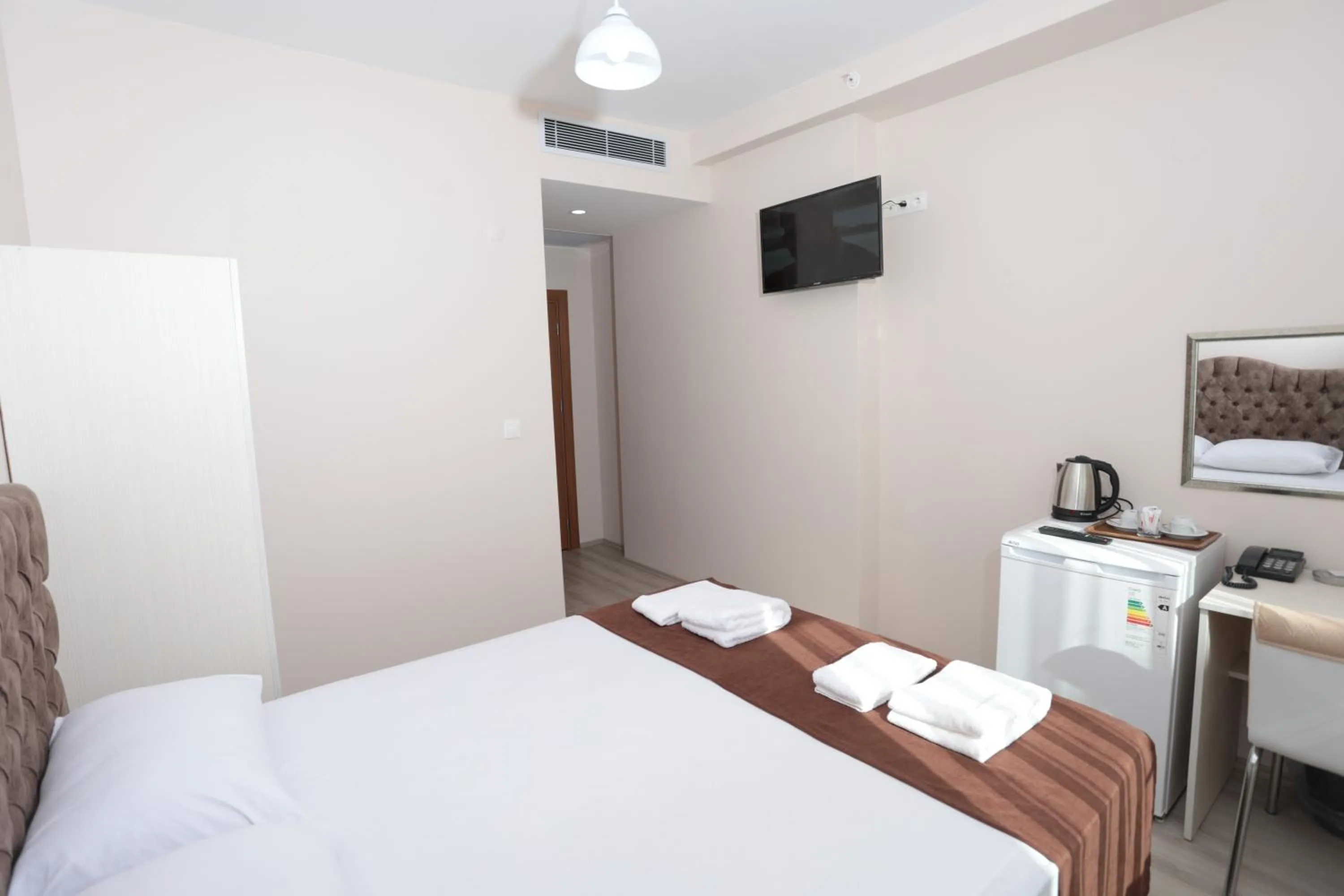 Bed in BEKSİTİ HOTEL