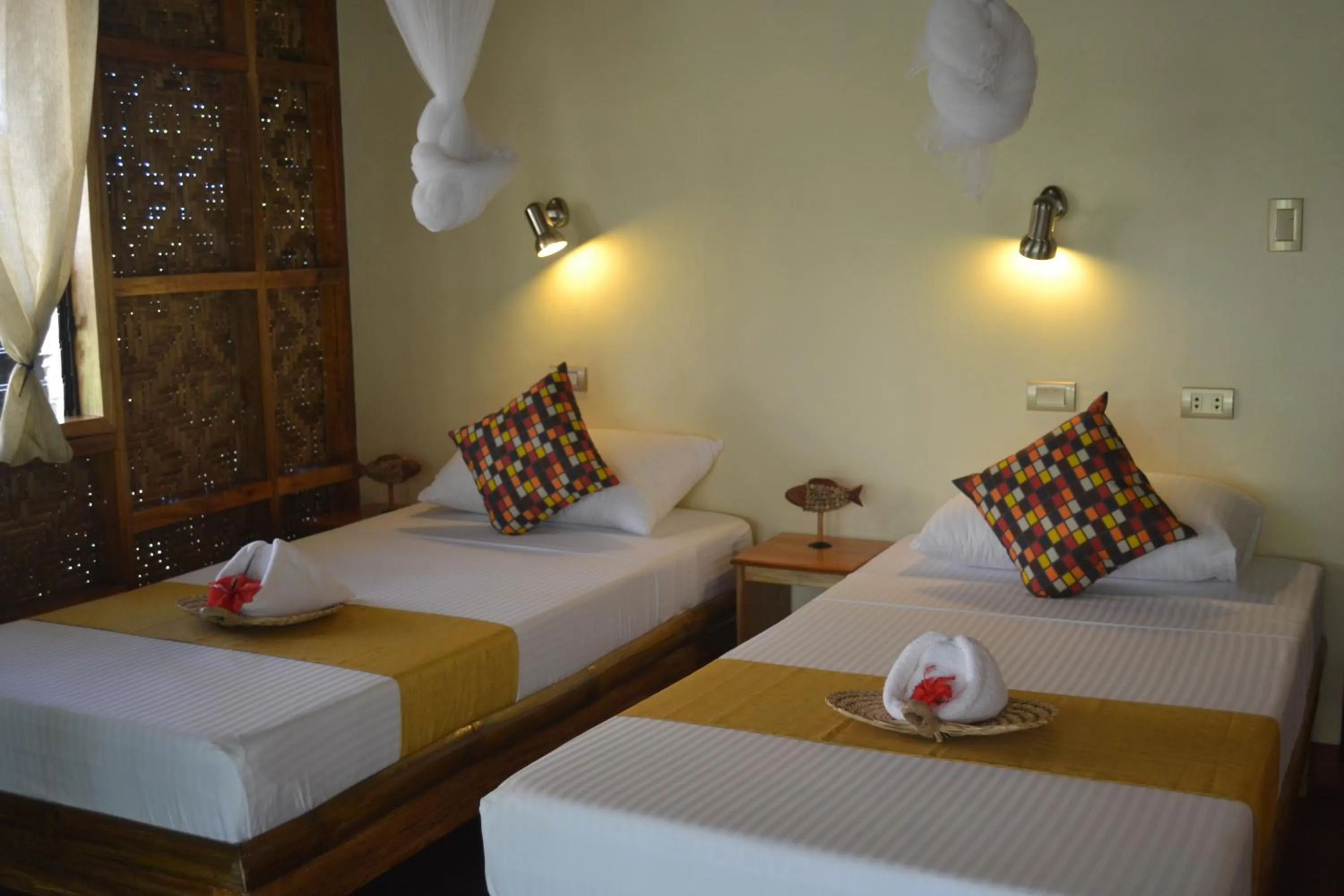 Photo of the whole room, Bed in Camiguin Volcan Beach Eco Retreat & Dive Resort