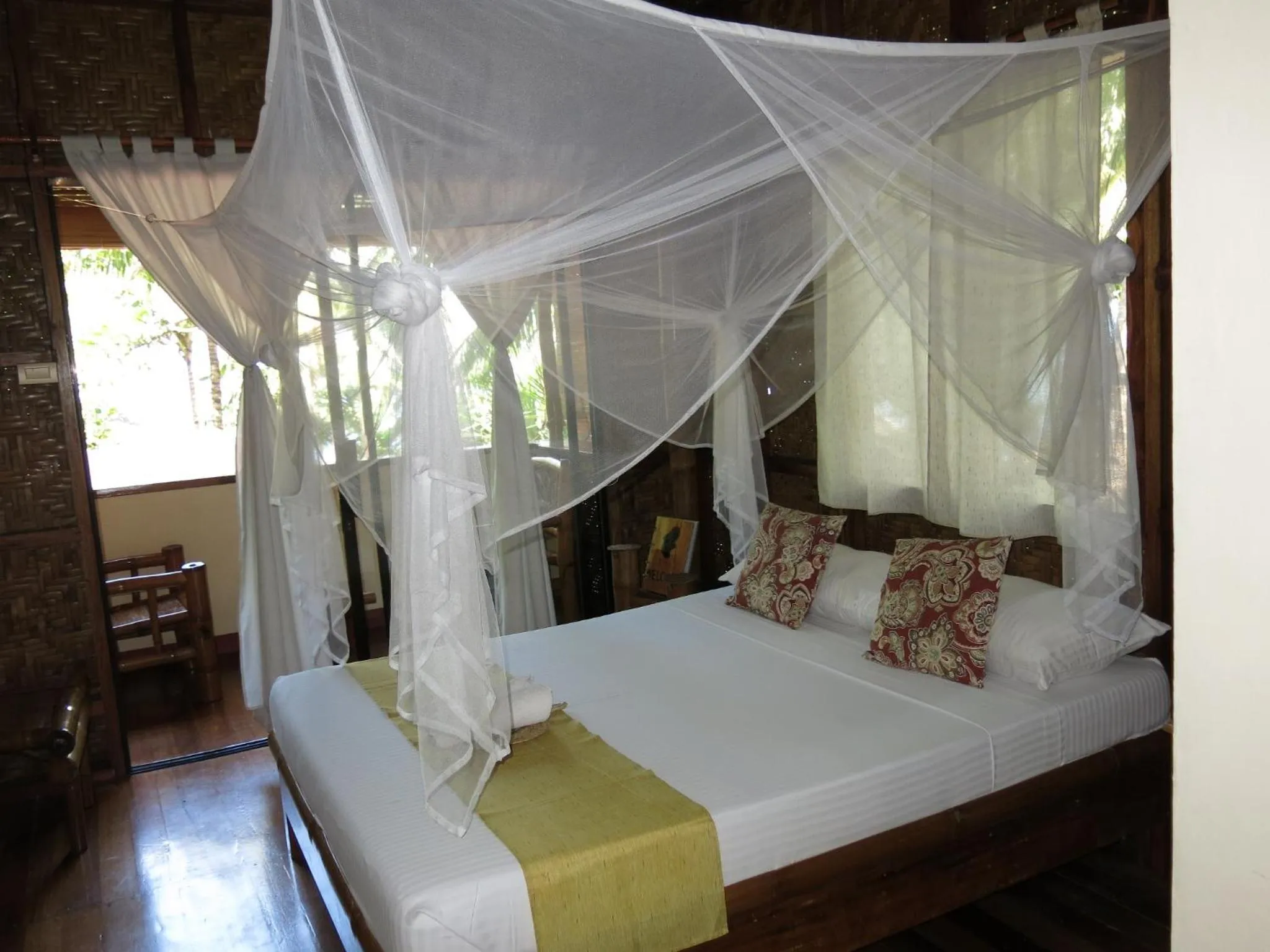 Bed in Camiguin Volcan Beach Eco Retreat & Dive Resort