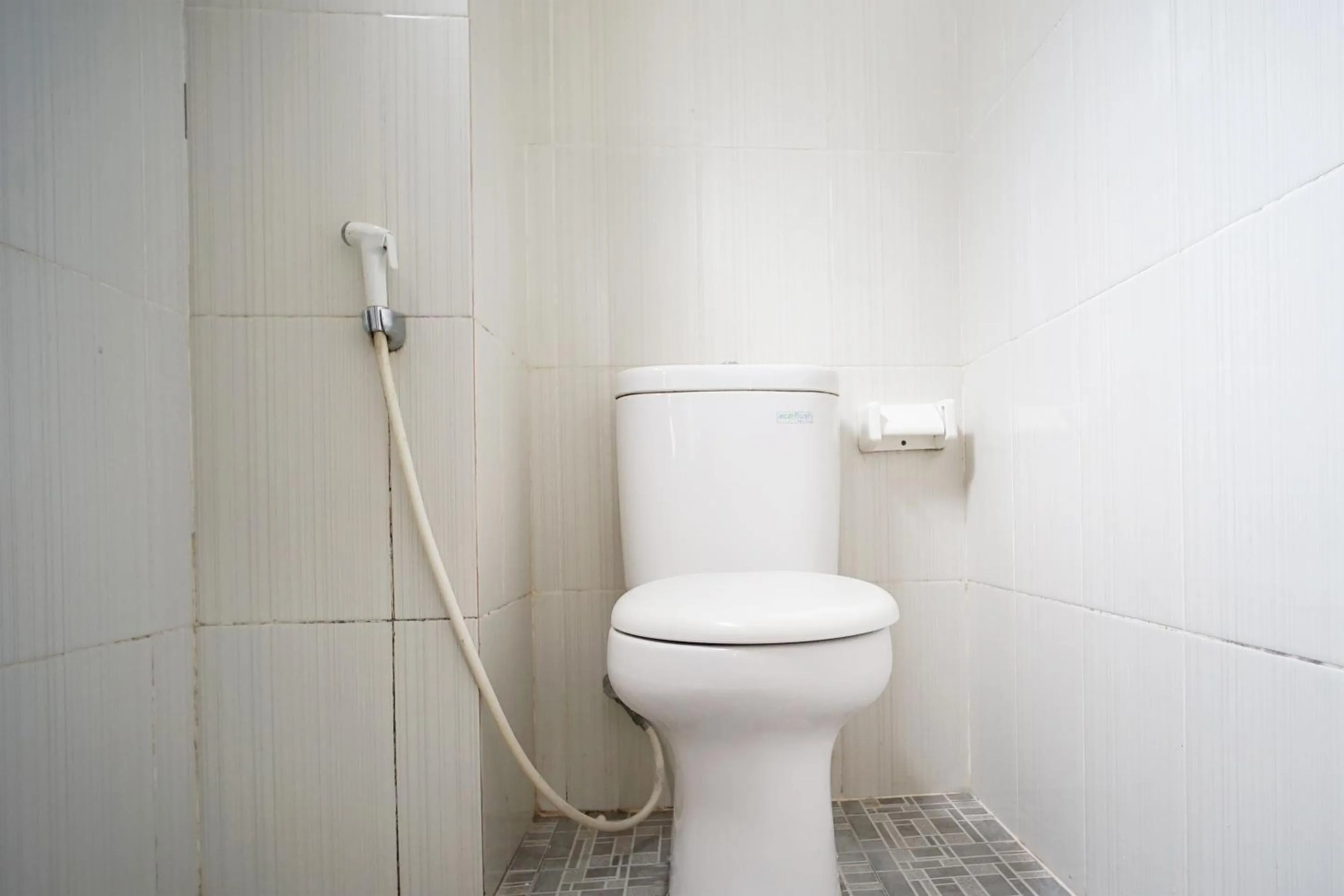 Bathroom in OYO 1477 Athar 88 Hotel