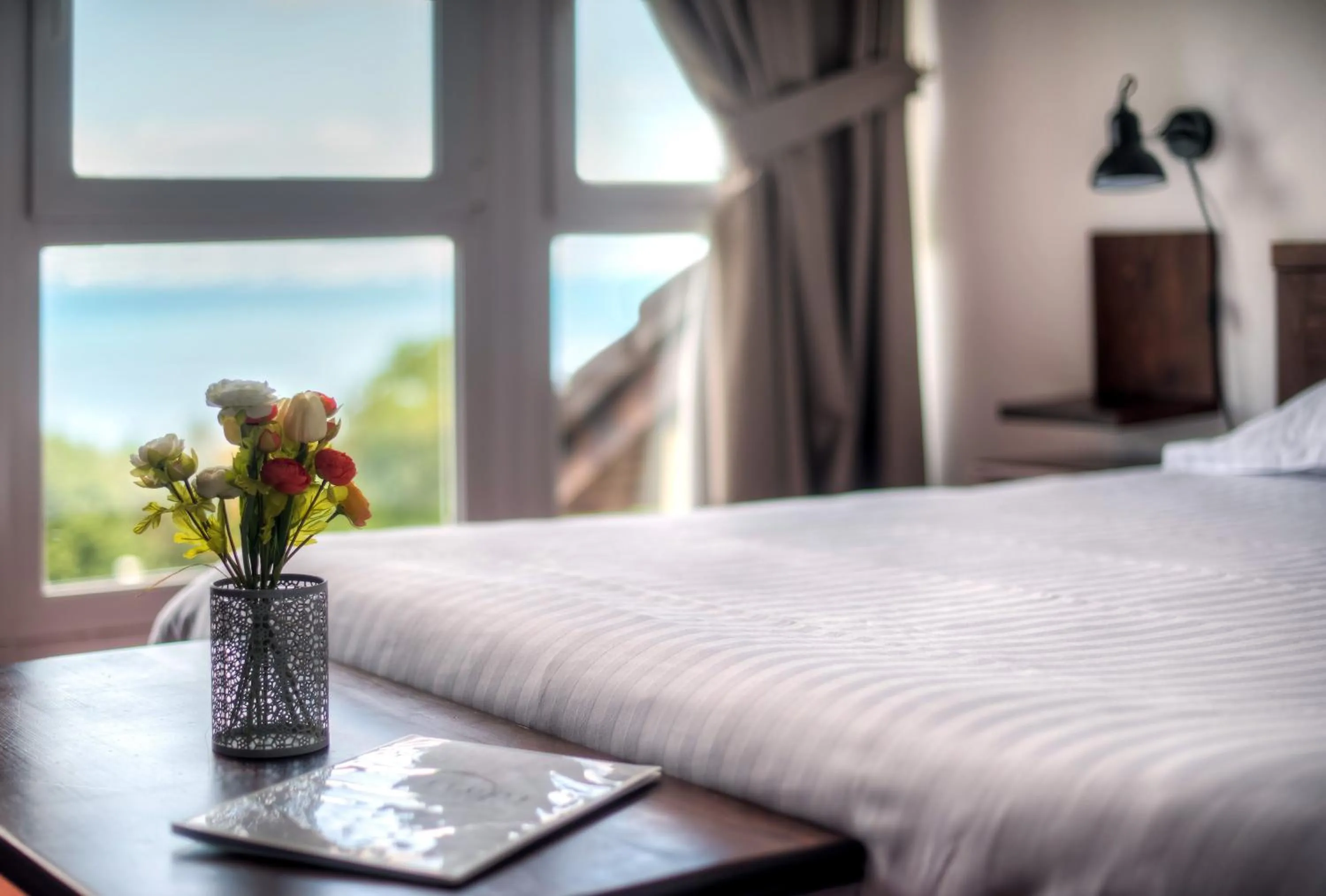 Photo of the whole room, Bed in Zenitude Evian Les Terrasses du Lac, an Ascend Collection Hotel