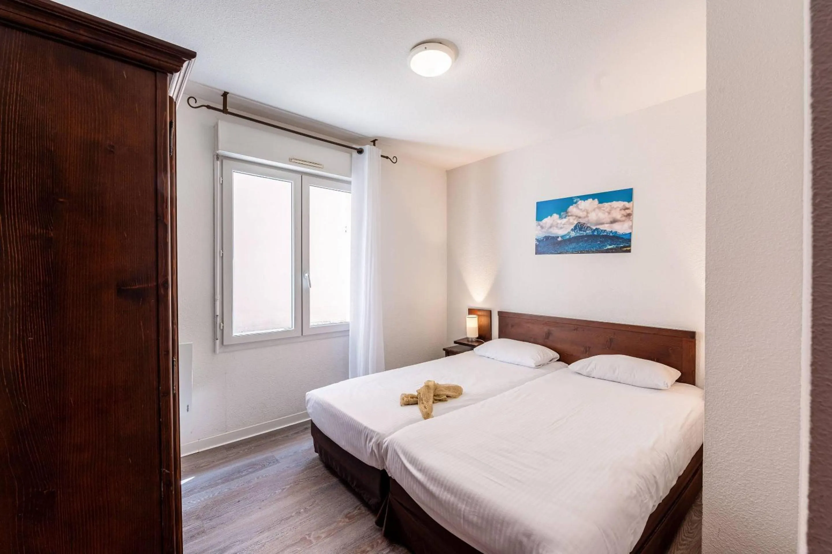 Bedroom, Bed in Zenitude Evian Les Terrasses du Lac, an Ascend Collection Hotel