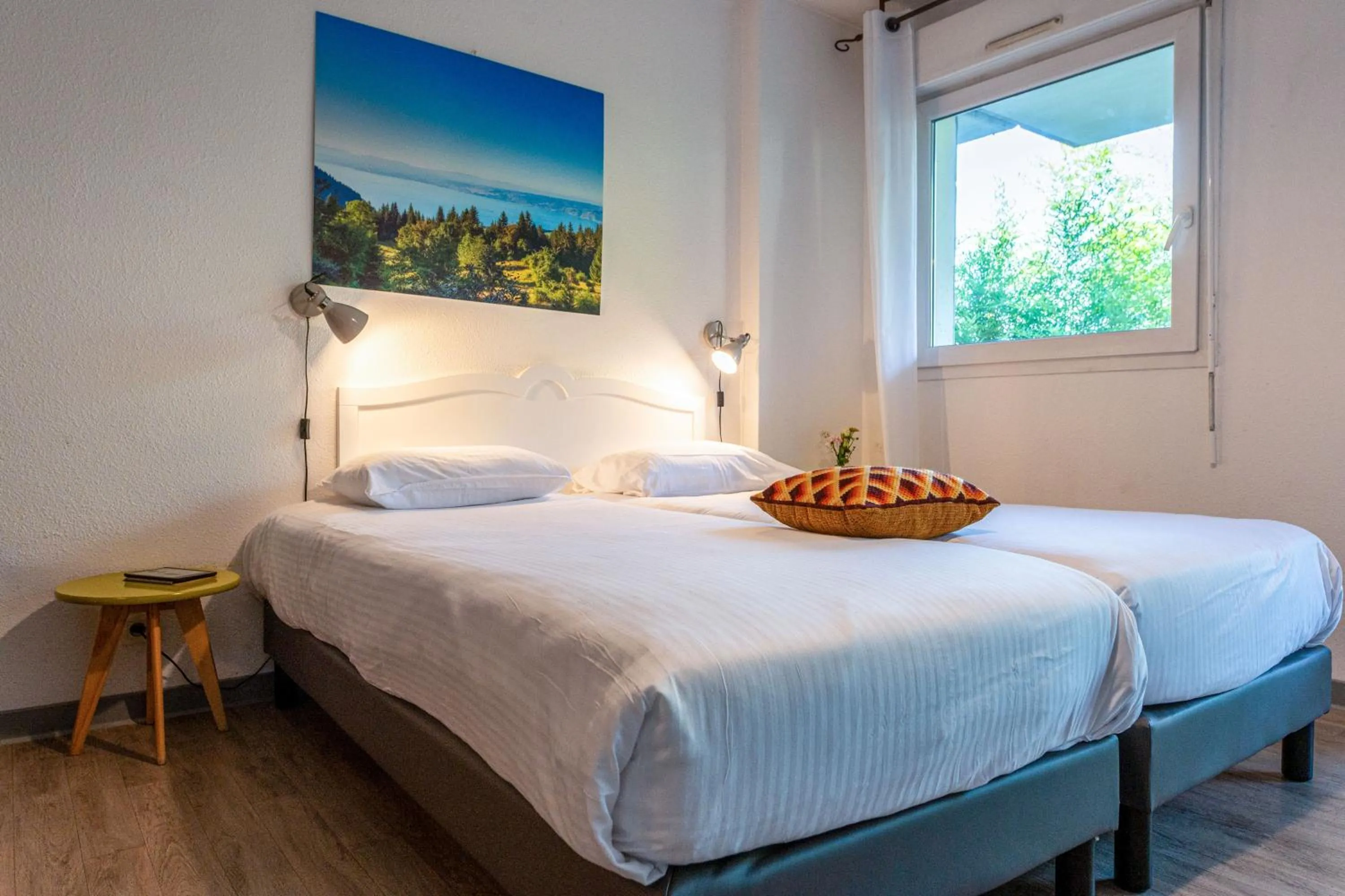 Bed in Zenitude Evian Les Terrasses du Lac, an Ascend Collection Hotel