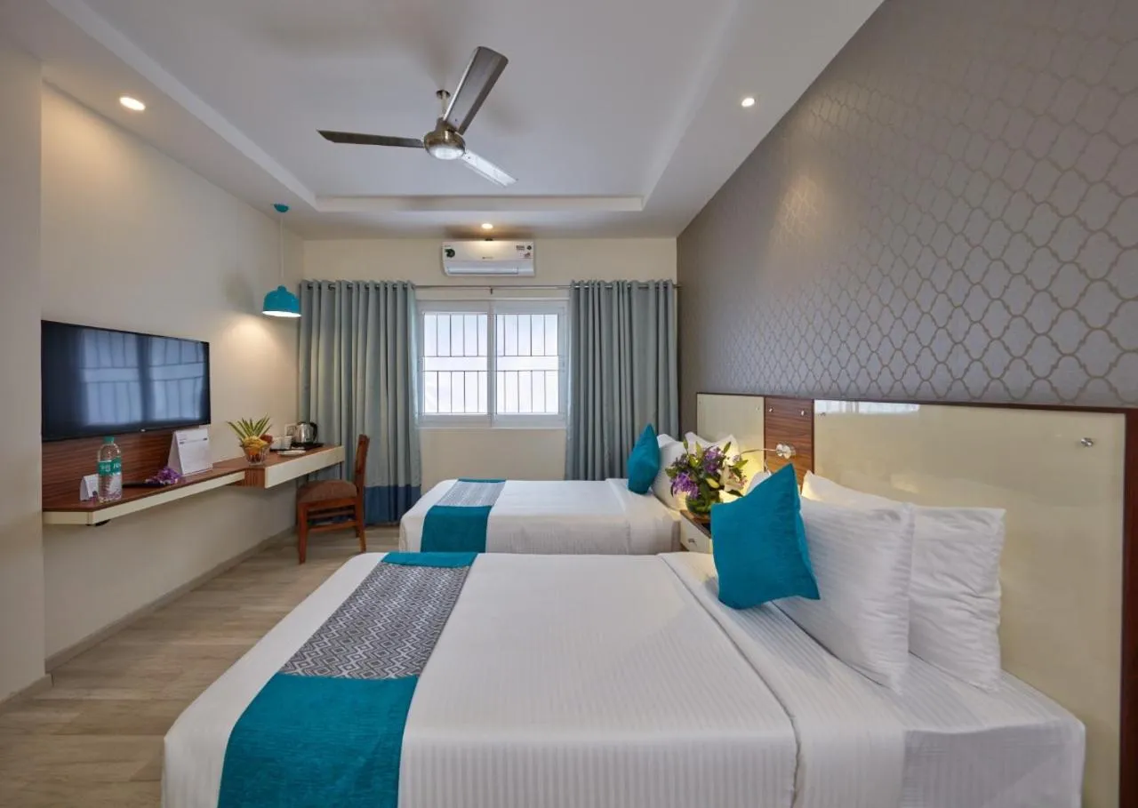 Bed in Regenta Inn Indiranagar by Royal Orchid Hotels