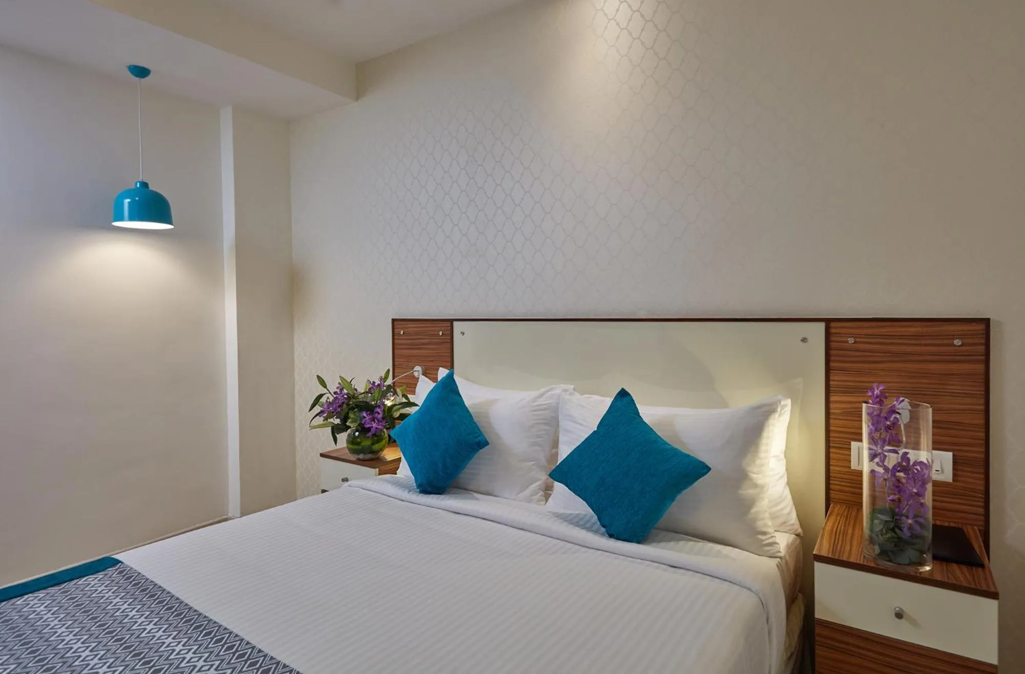 Bedroom, Bed in Regenta Inn Indiranagar by Royal Orchid Hotels