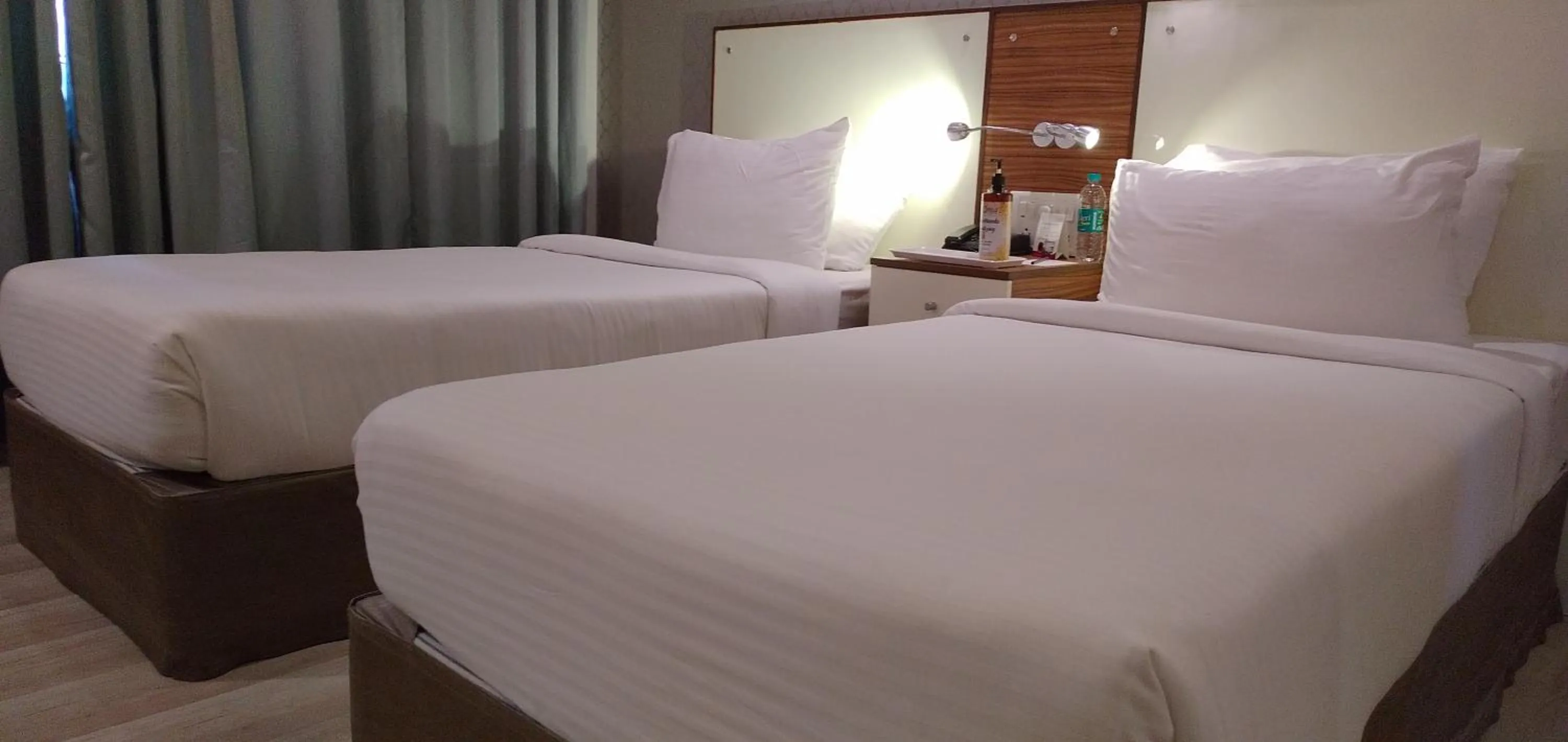 Bed in Regenta Inn Indiranagar by Royal Orchid Hotels