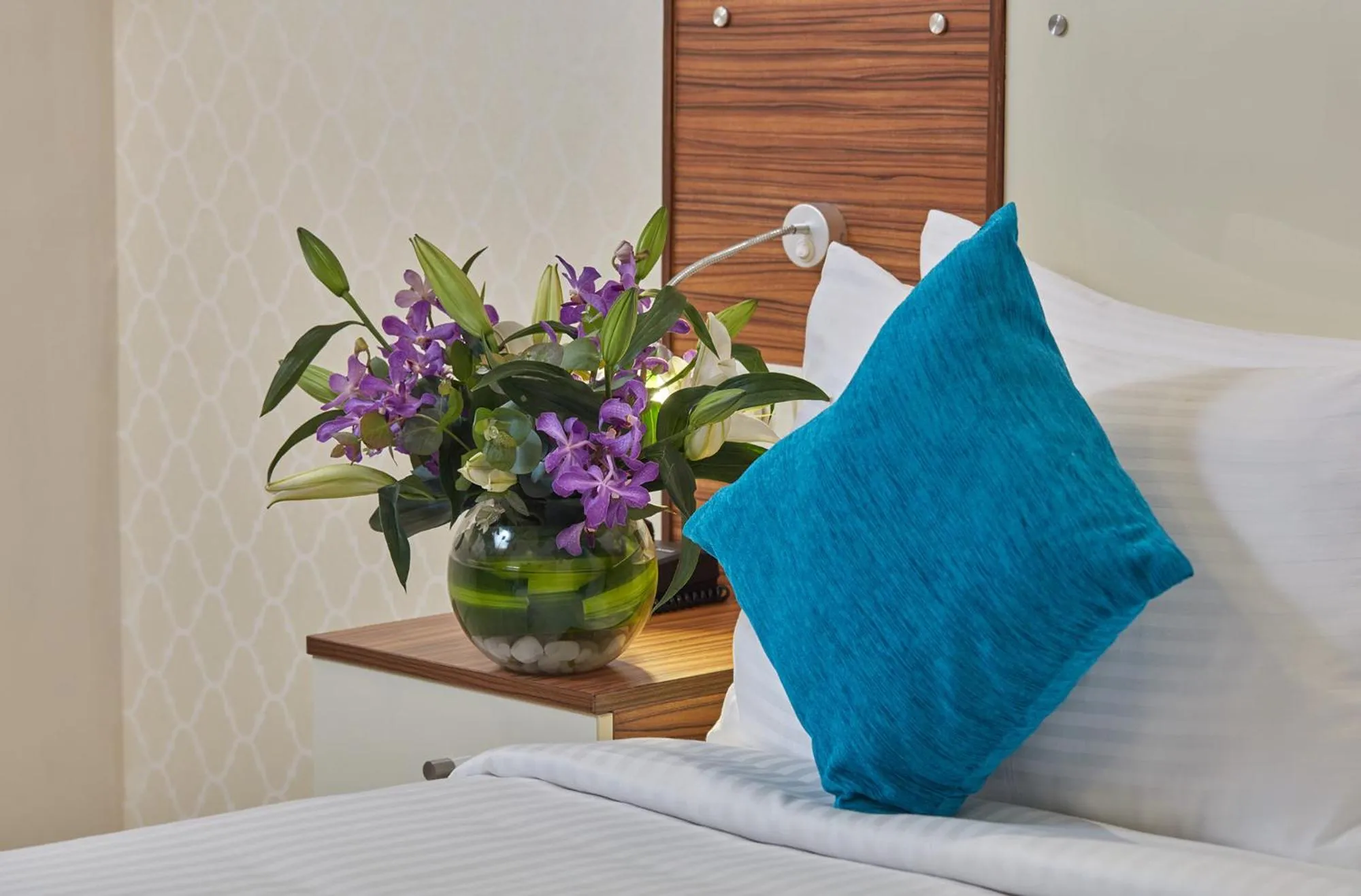 Bedroom, Bed in Regenta Inn Indiranagar by Royal Orchid Hotels