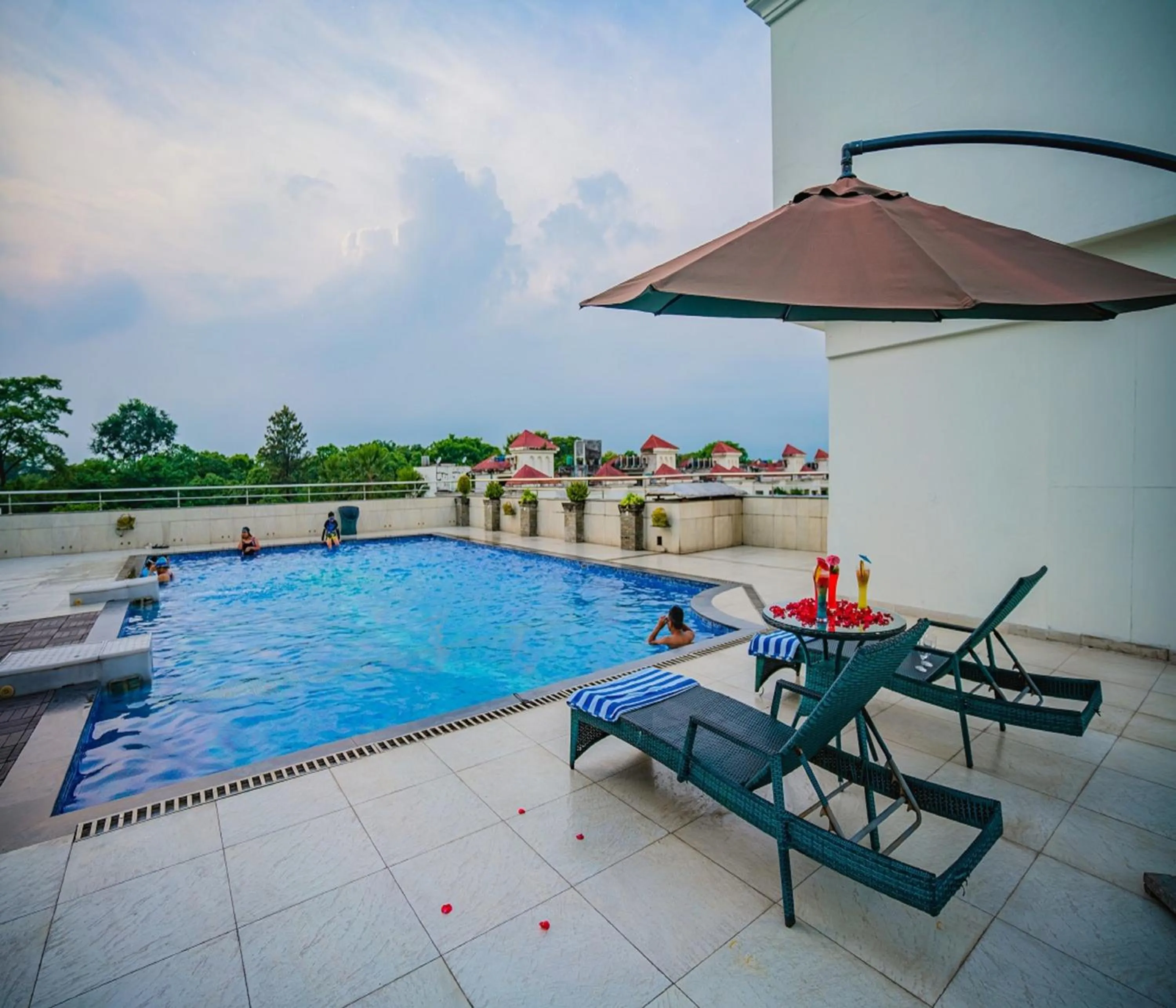 Swimming pool in Barsana Hotel & Resort Siliguri