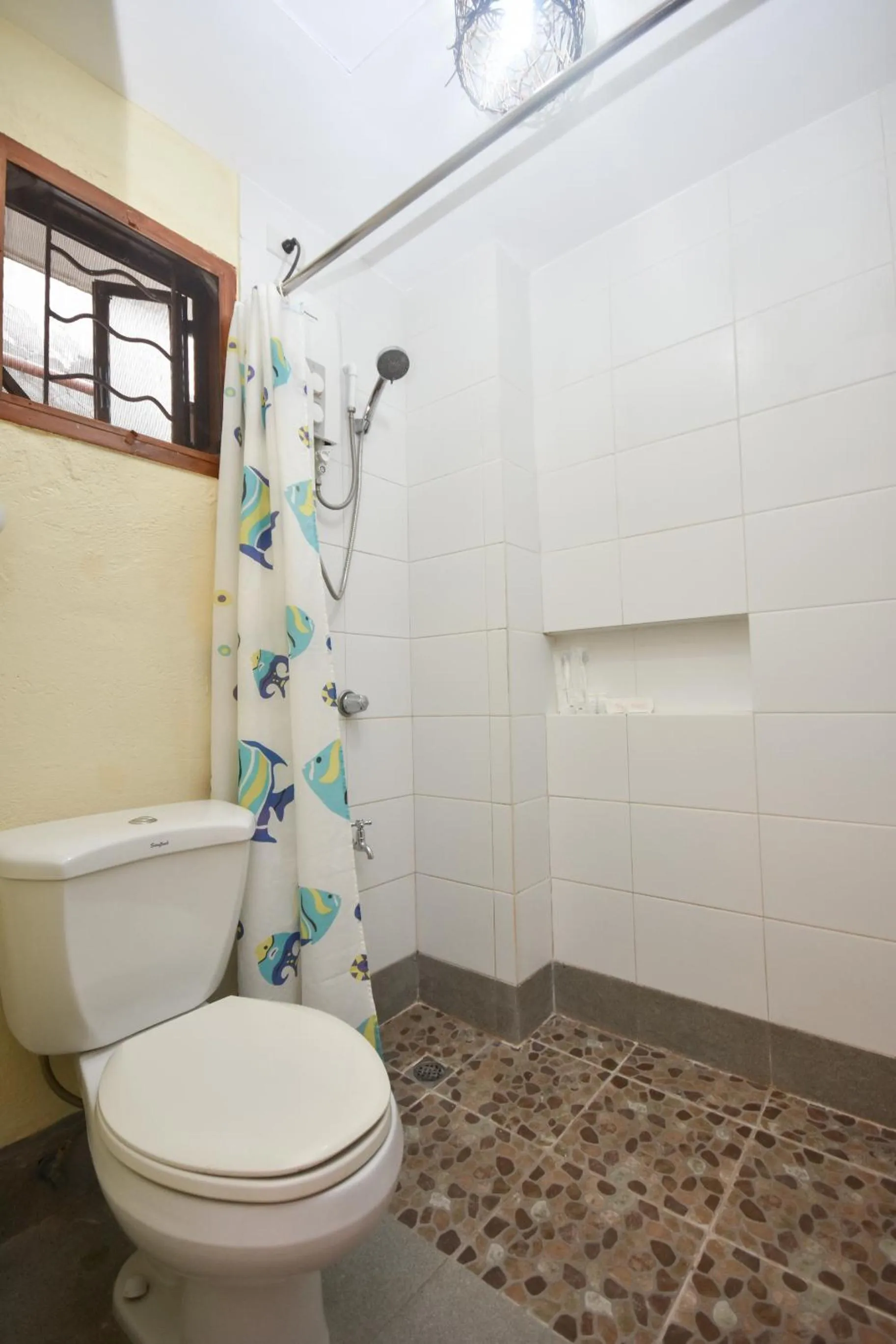 Bathroom in Agos Boracay Rooms + Beds