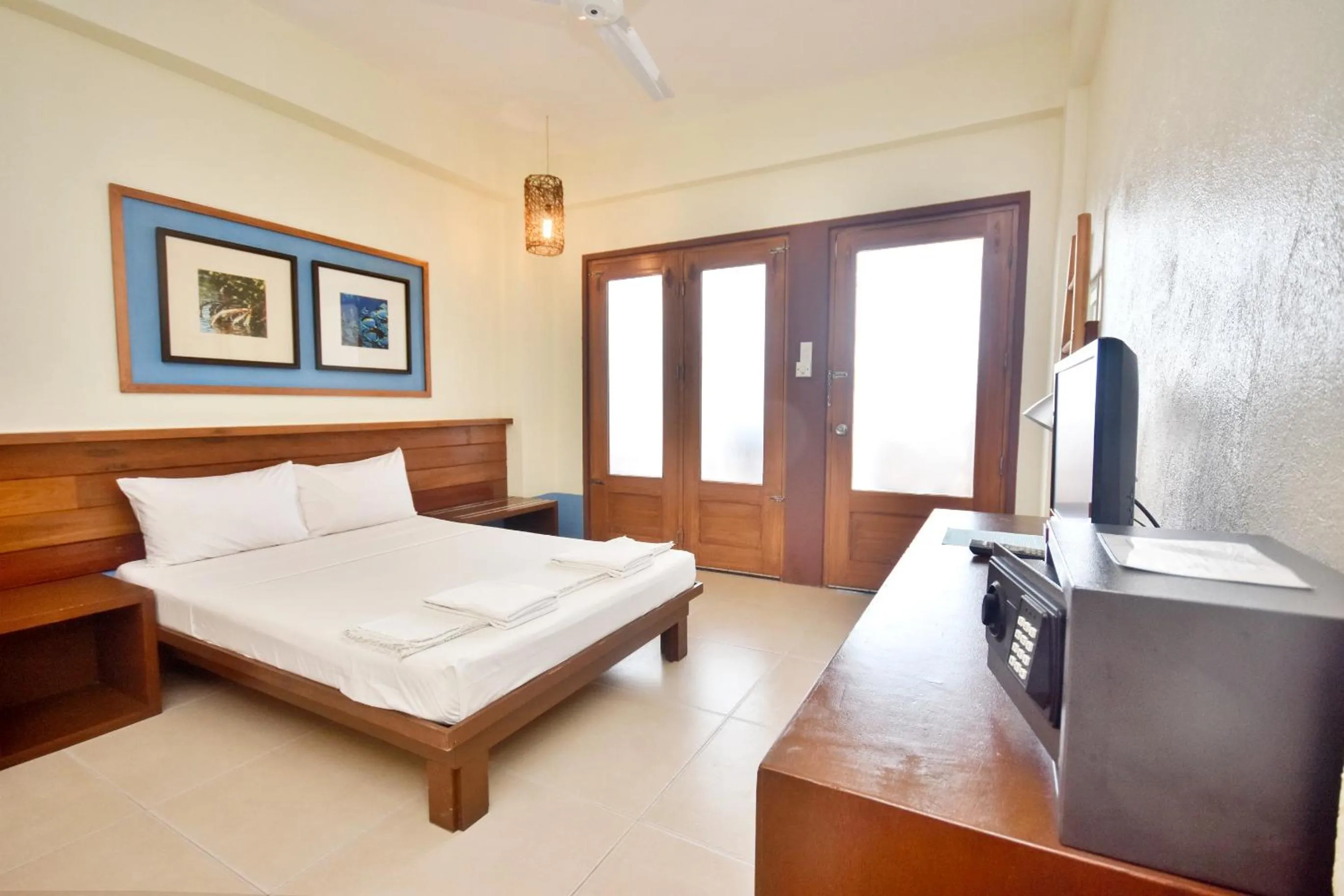 Photo of the whole room, Bed in Agos Boracay Rooms + Beds