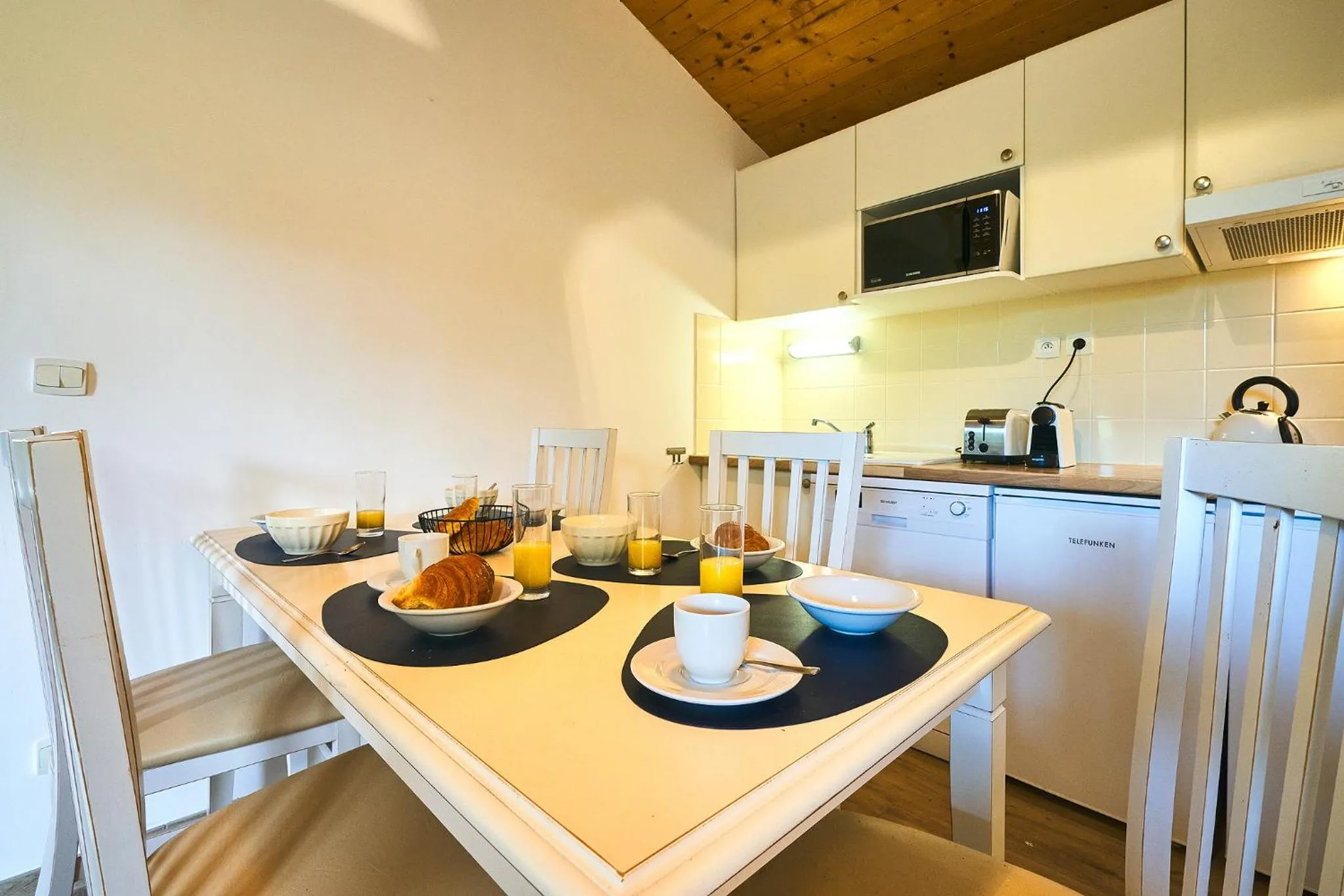 Kitchen or kitchenette in Les Cottages Du Lac
