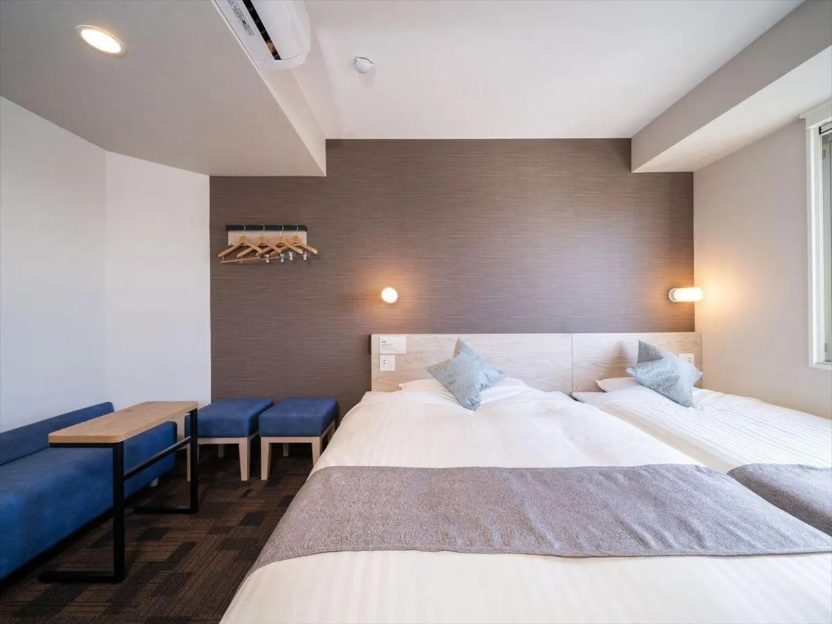 Bed in Super Hotel Premier Saitama Higashiguchi