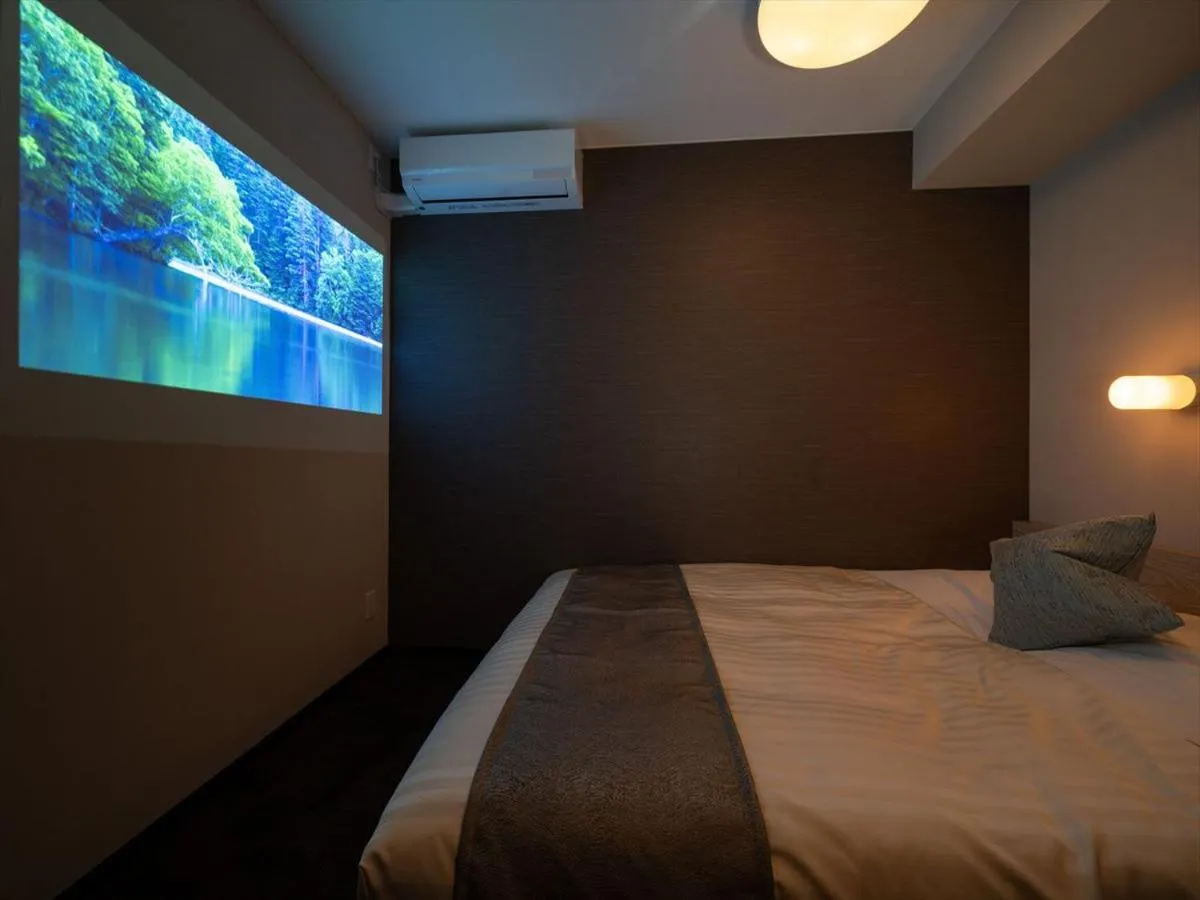 Bed in Super Hotel Premier Saitama Higashiguchi