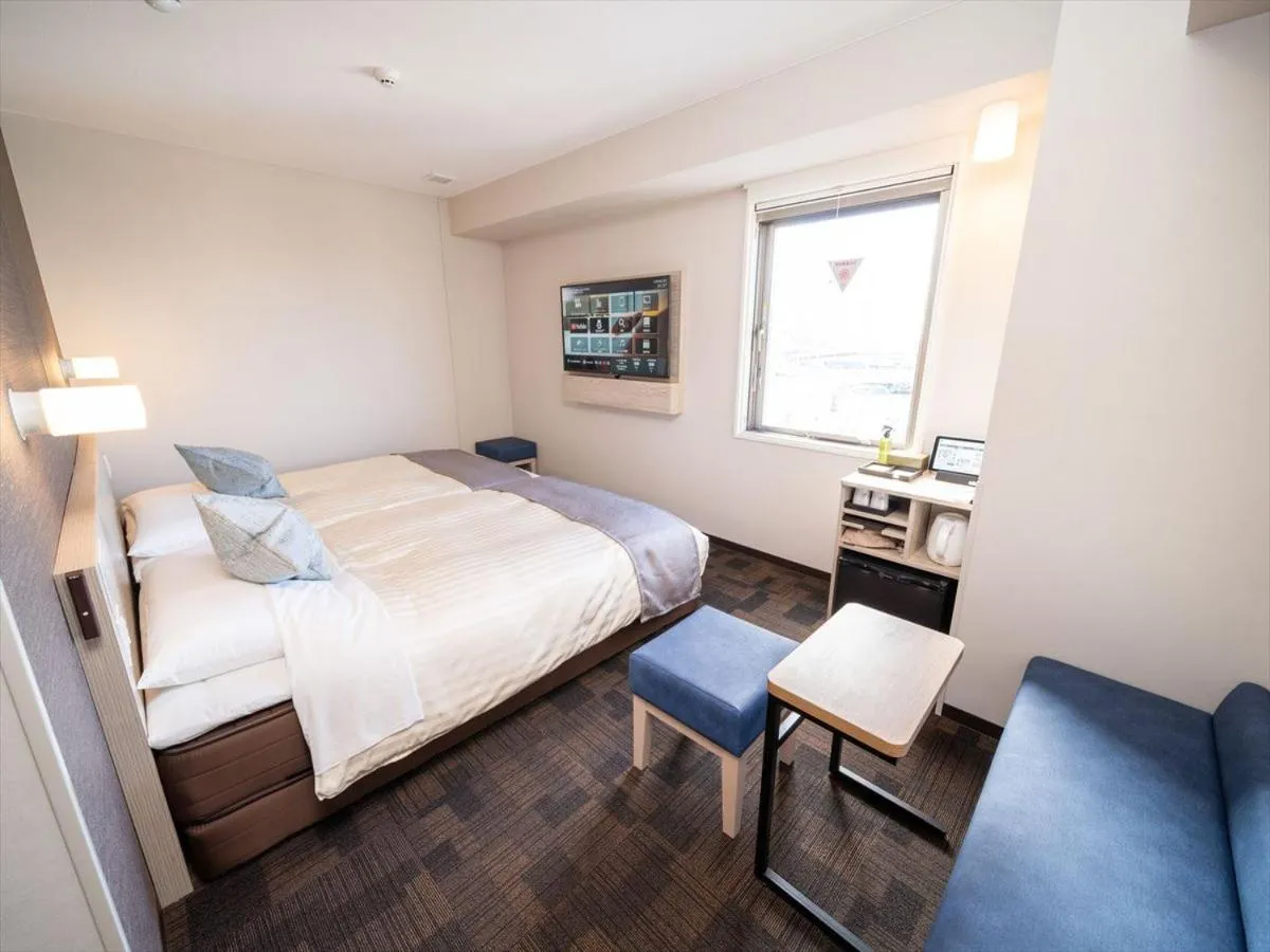 Bed in Super Hotel Premier Saitama Higashiguchi